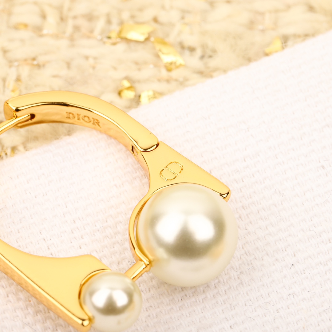 Dior Large and small pearl earrings