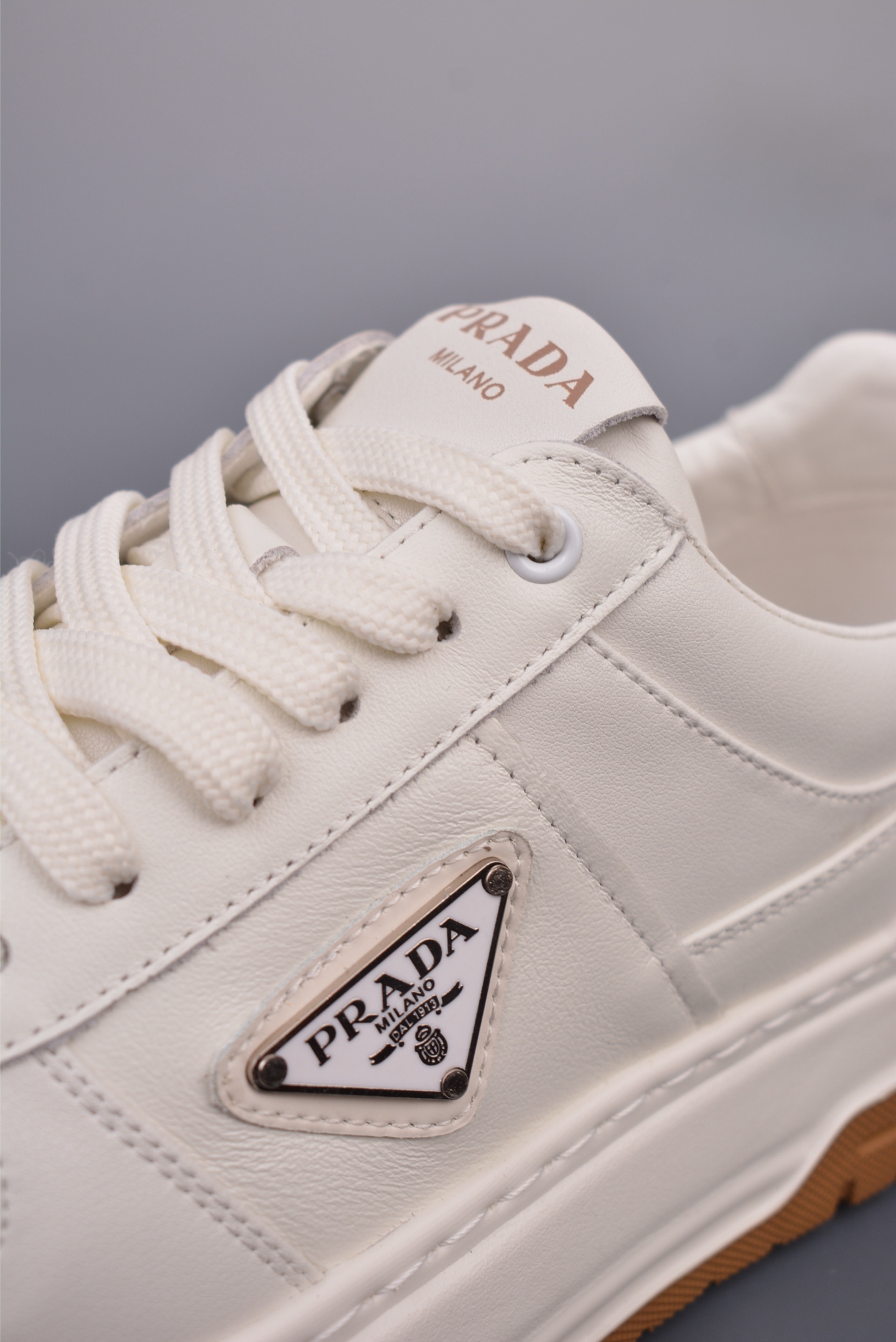 Prada PRAX 01 Triangle Logo Leather Sneakers off-white brown 3D933M_3LF5_FG000