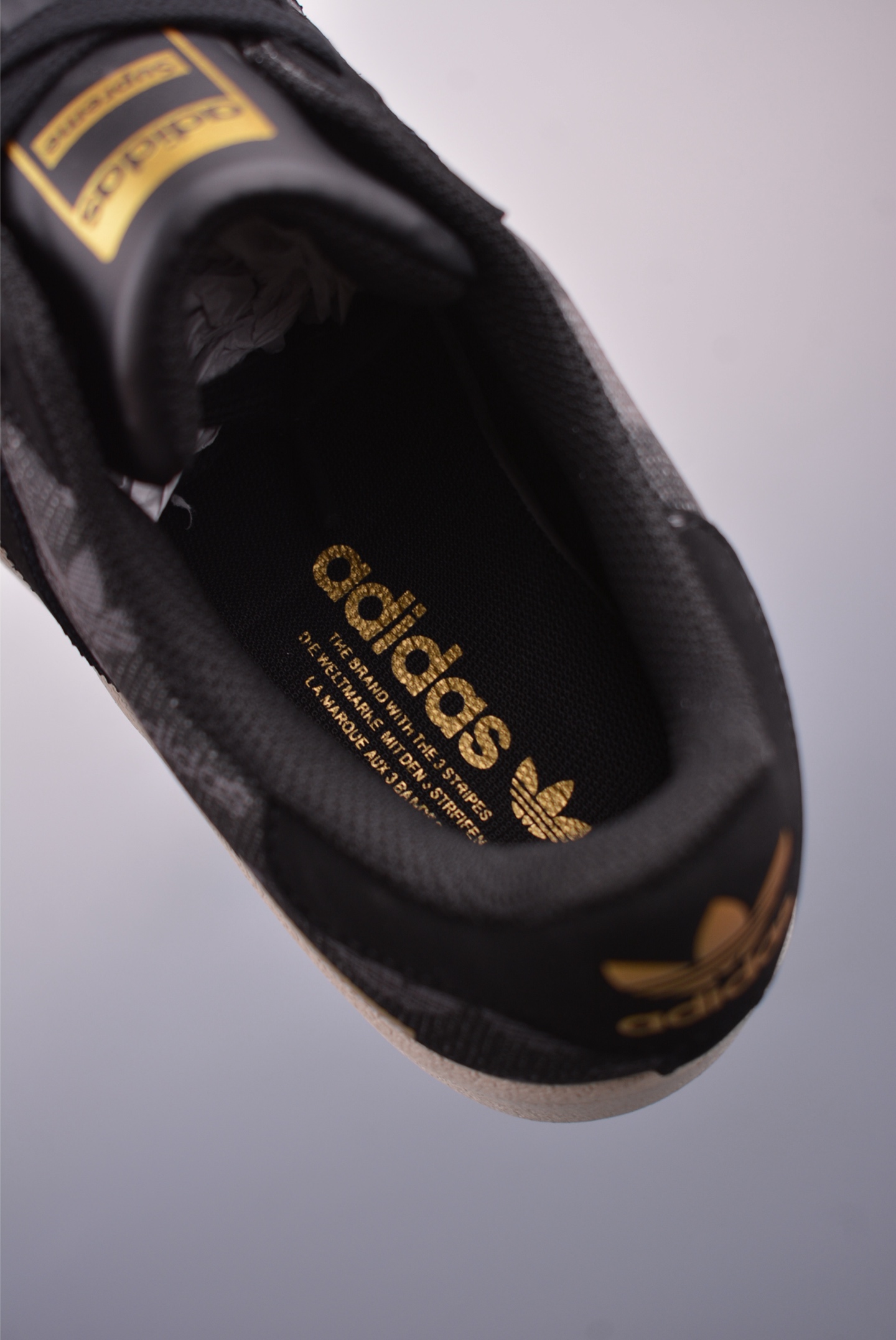 Supreme x Adidas Originals Superstar sneakers Black and Gold Trefoil Z2531