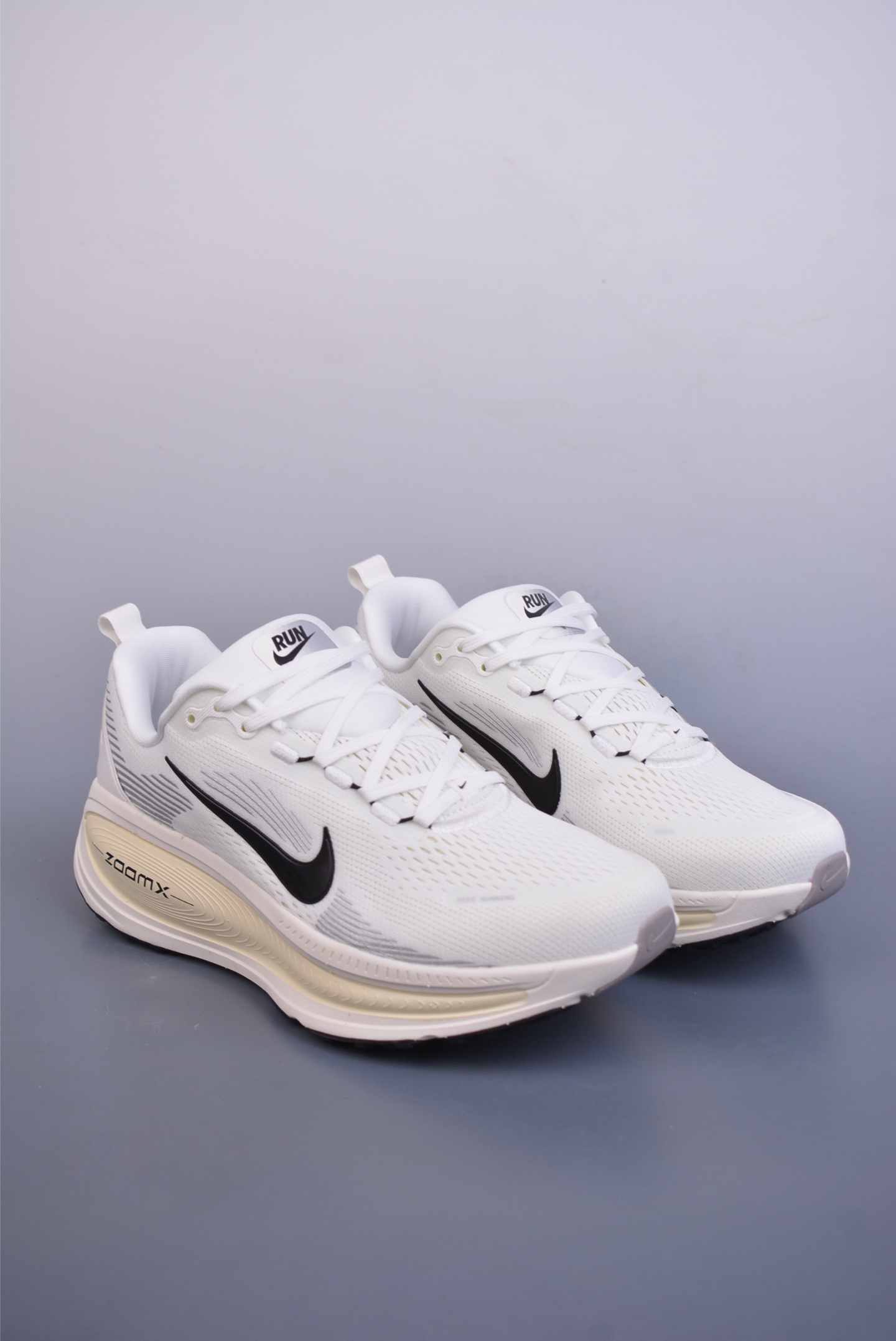 Nike Vomero 18 ZoomX running shoes off-white and black hook HM6803-101