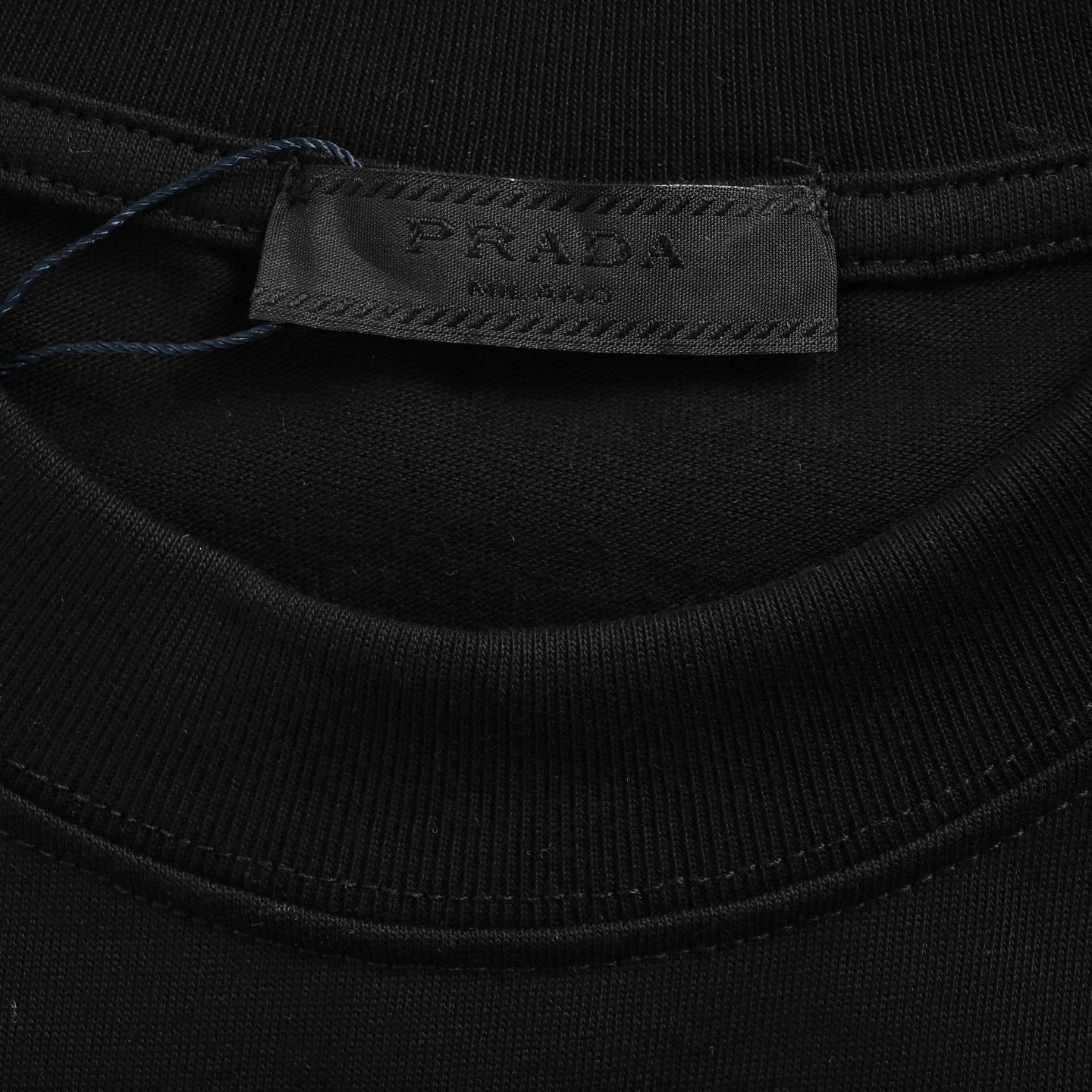 Prada 25ss short sleeve bag with figurine print