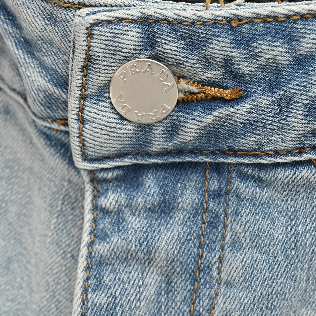 Prada washed jeans with embossed logo on back pocket
