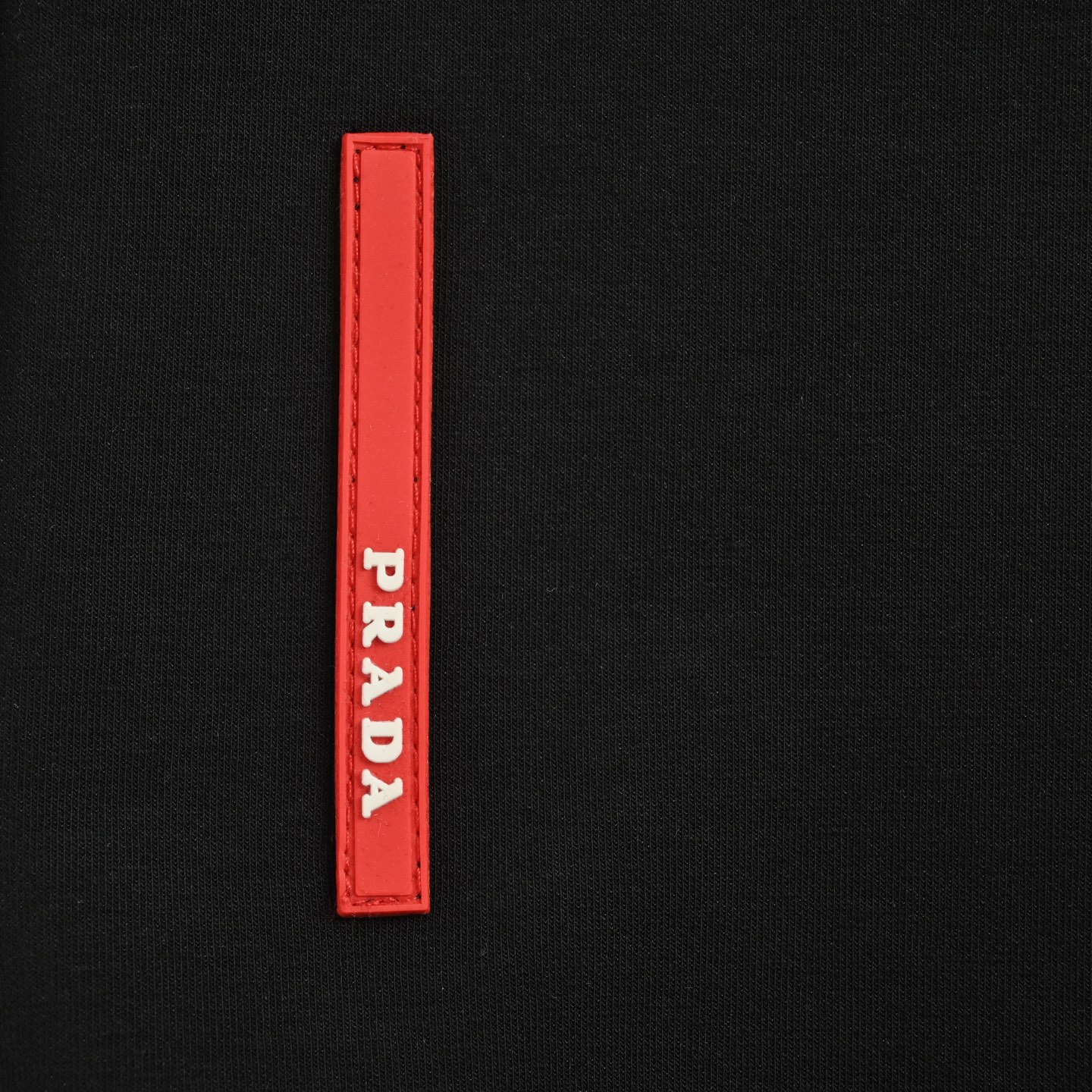 Prada 25ss triangle red rubber logo shorts