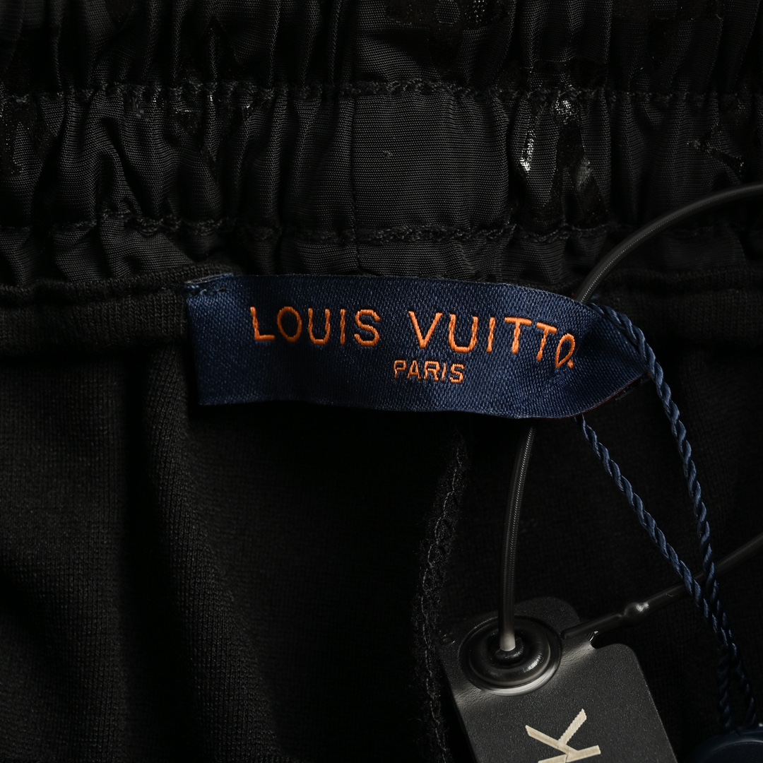 Louis Vuitton catwalk trousers with embroidered logo
