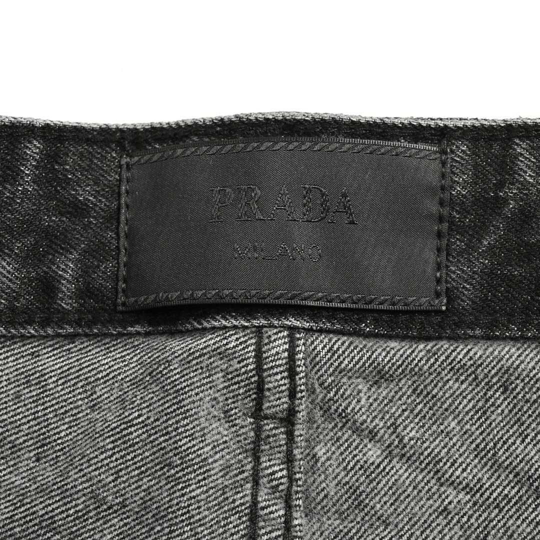 Prada 23Fw triangle logo embossed washed denim