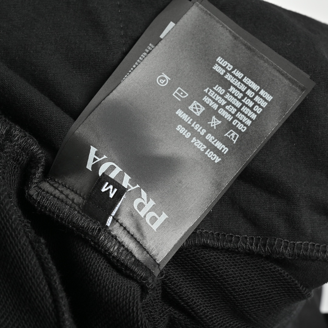 Prada belt buckle triangle logo cargo shorts