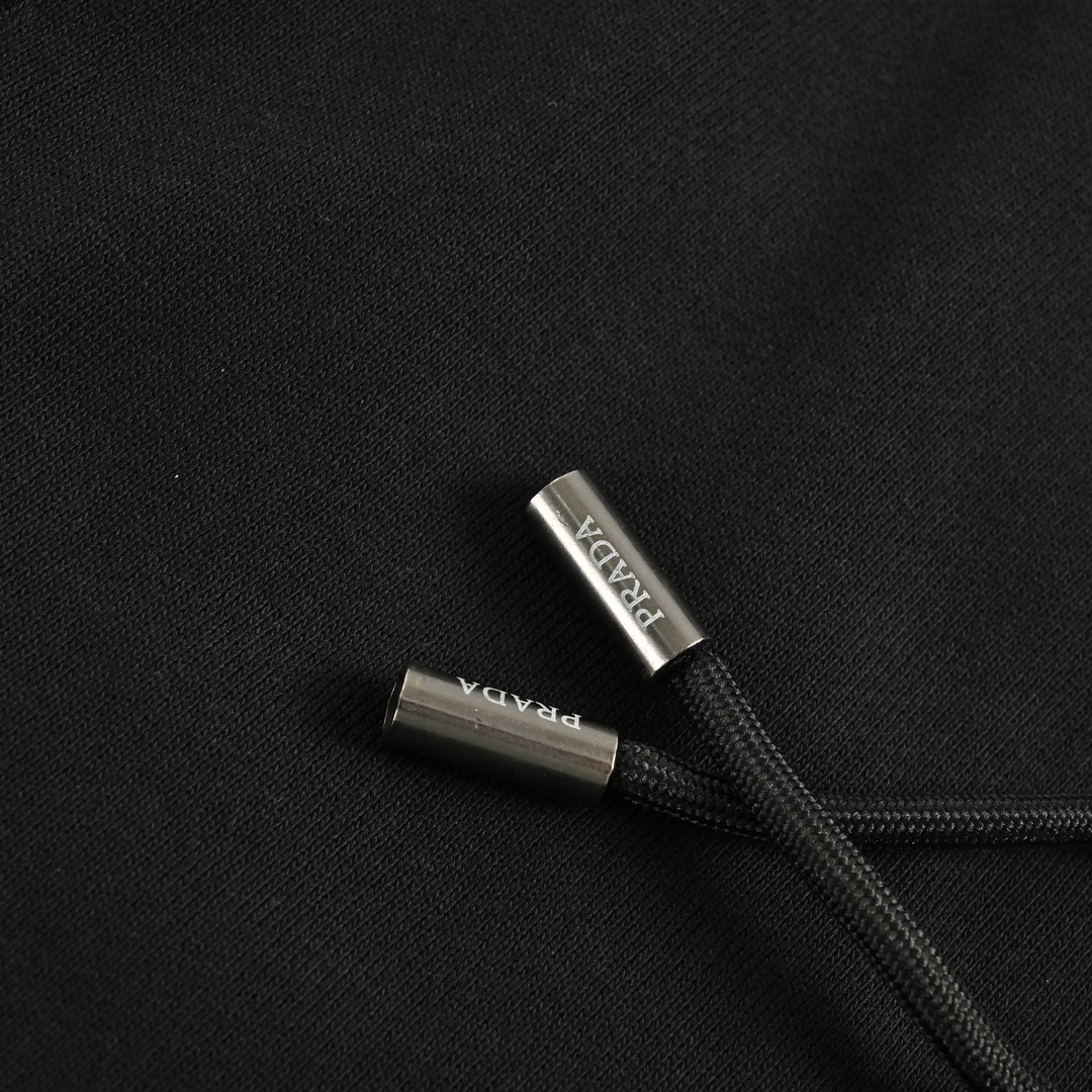 Prada triangle logo taped pocket trousers