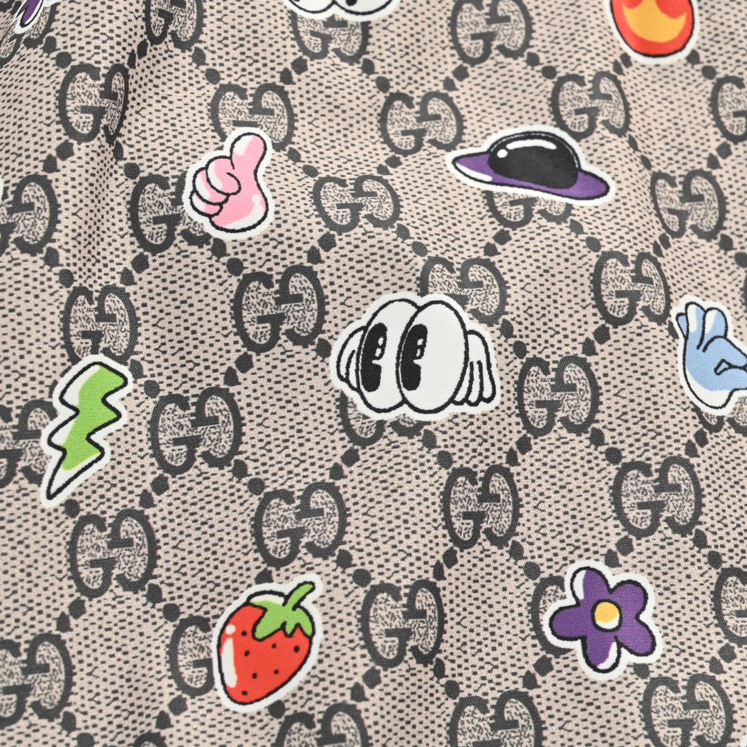 Gucci 24ss all over printed double G cartoon element beach shorts
