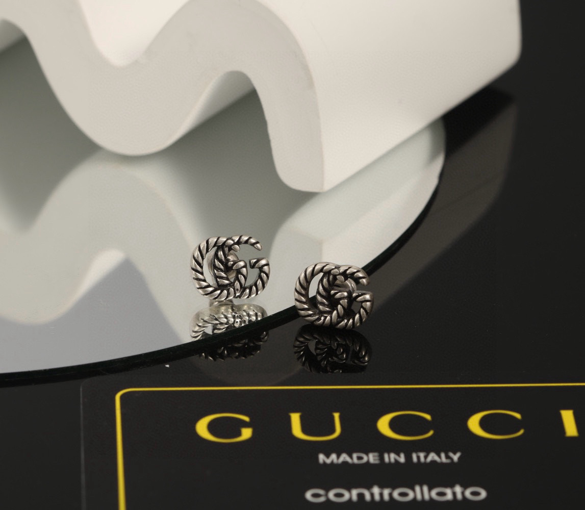 GUCCi GG distressed earrings