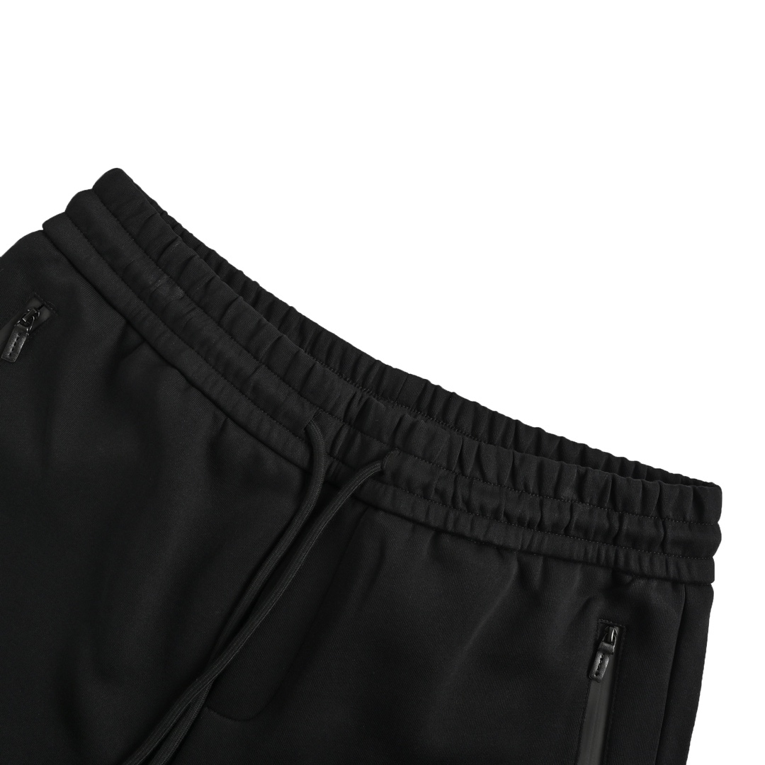 Prada embroidered logo trousers