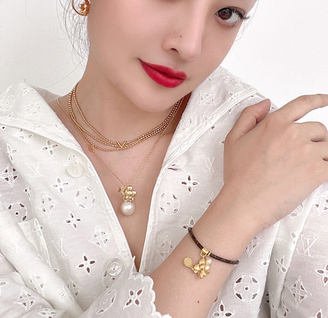 Louis Vuitton triple bead necklace