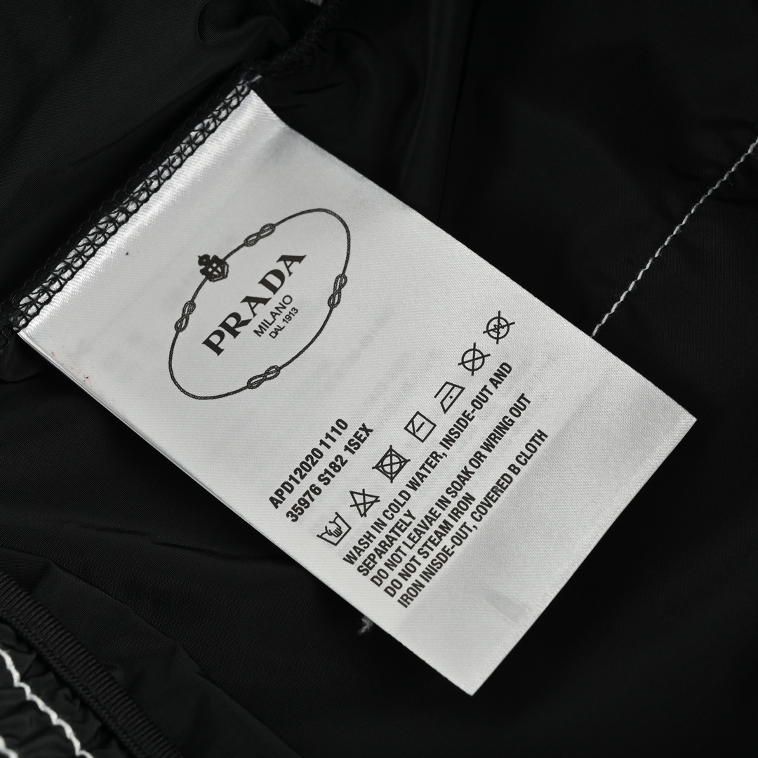 Prada 23ss nylon shorts with exposed triangle logo