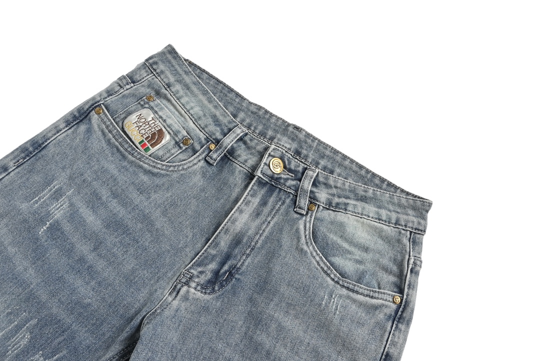 Gucci & The North face co-branded embroidered logo jeans