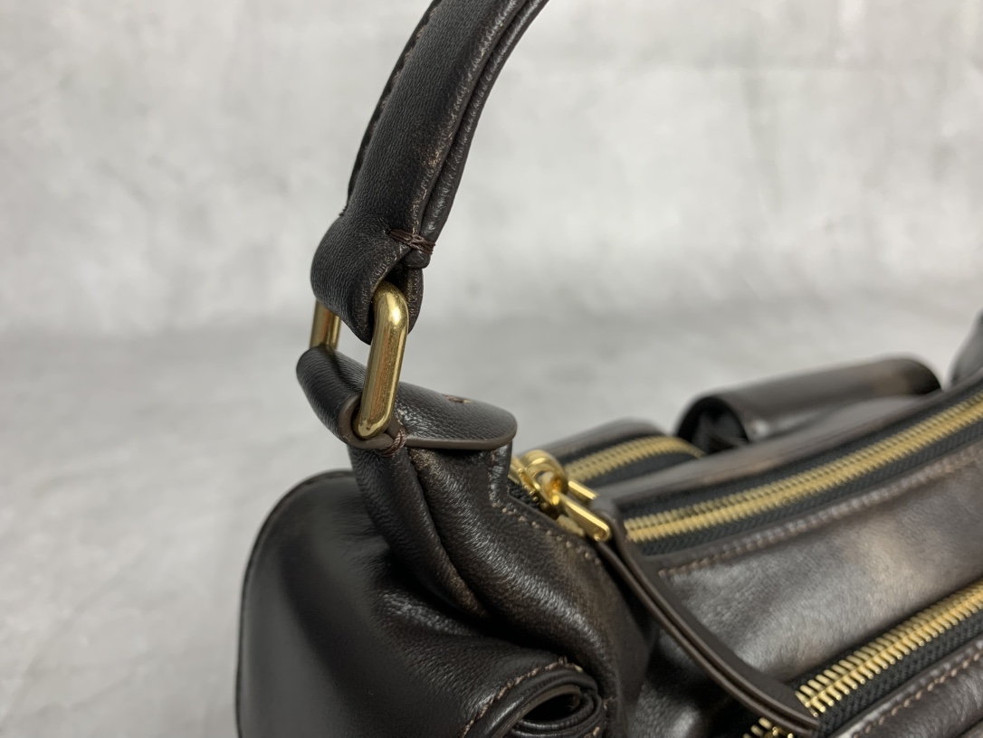 Miu Miu Multi-Pocket Biker Bag