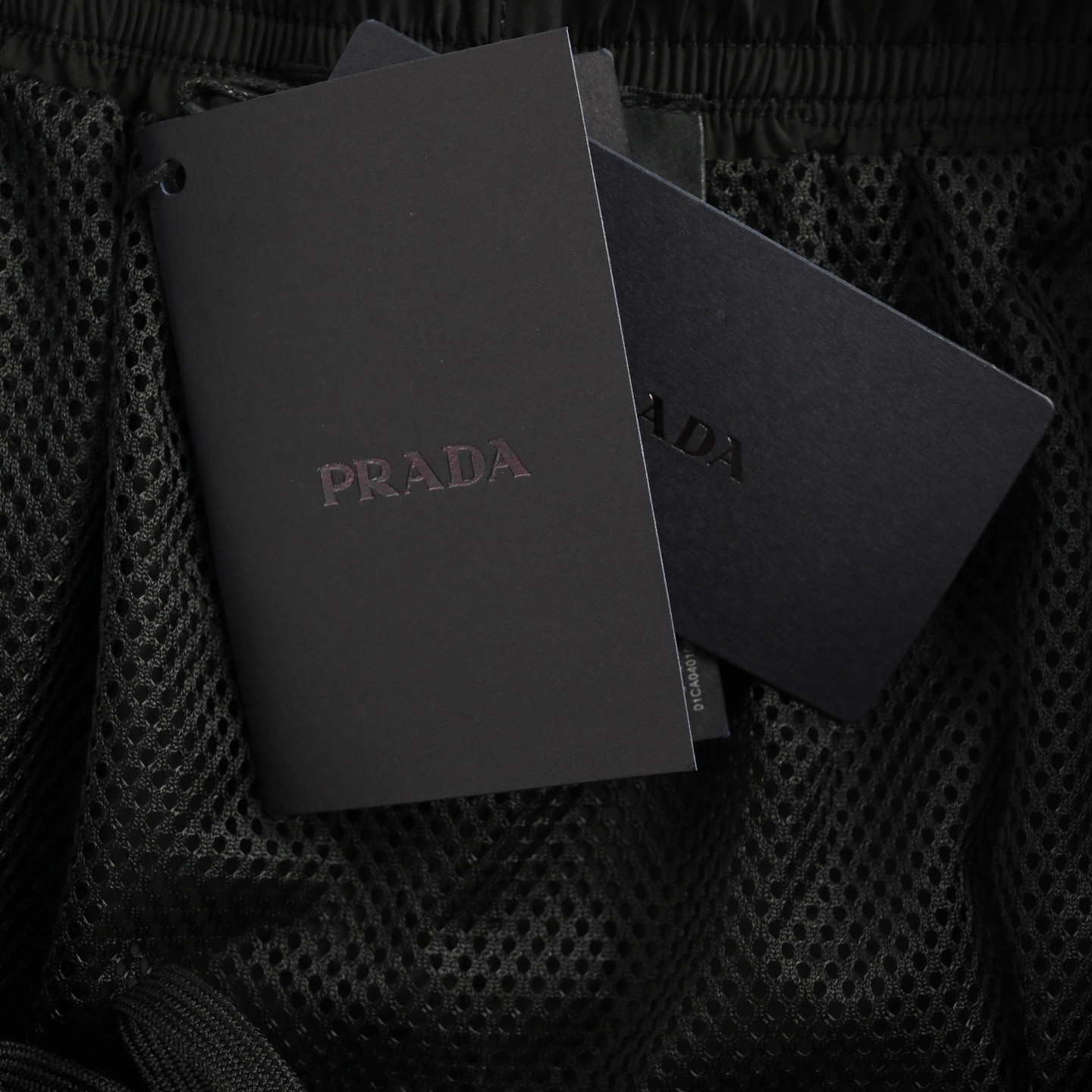 Prada 25ss waist triangle logo beach shorts