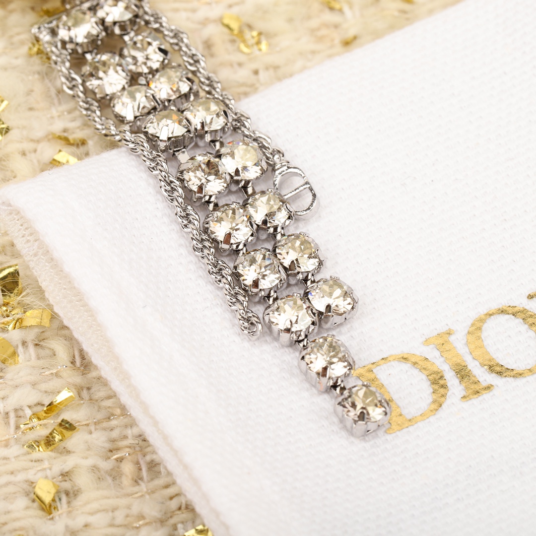 Dior Large and small pearl tassel earrings