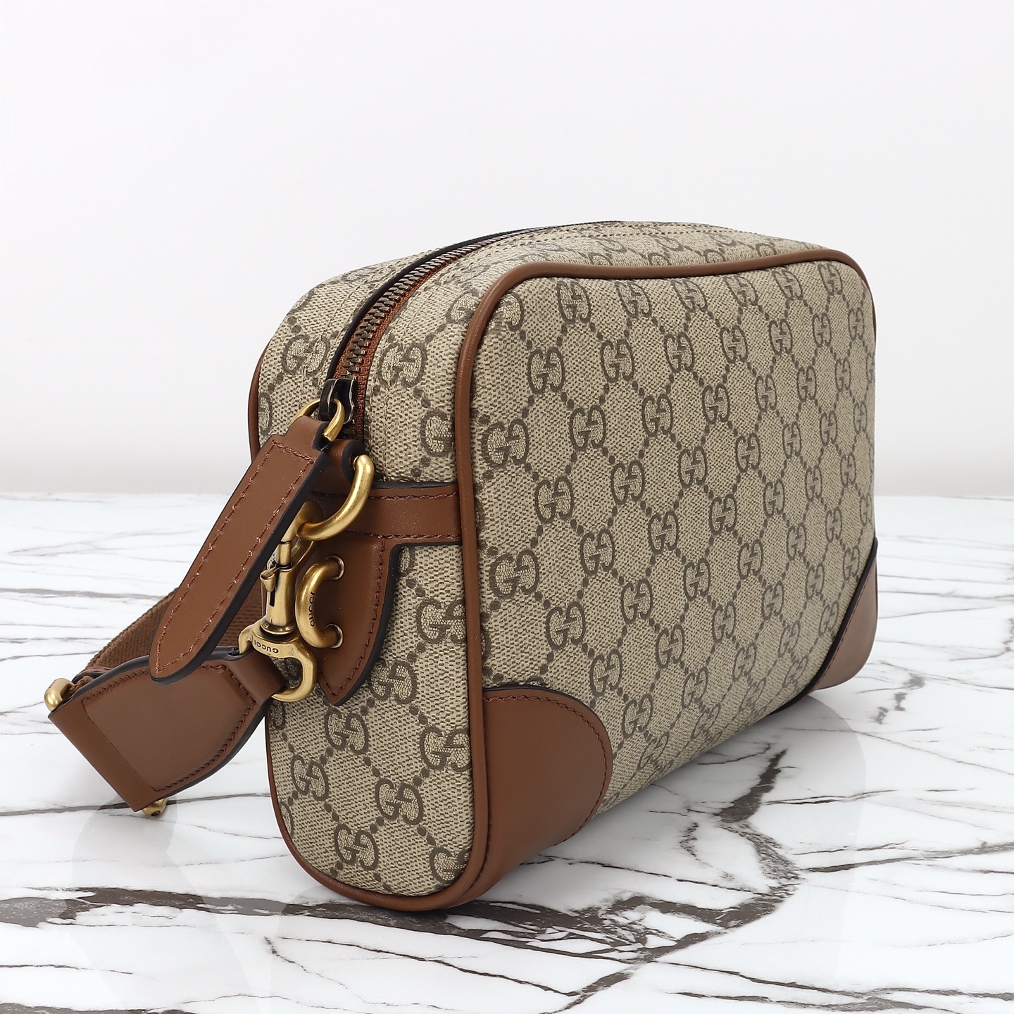 Gucci GG Emblem small crossbody bag 821155