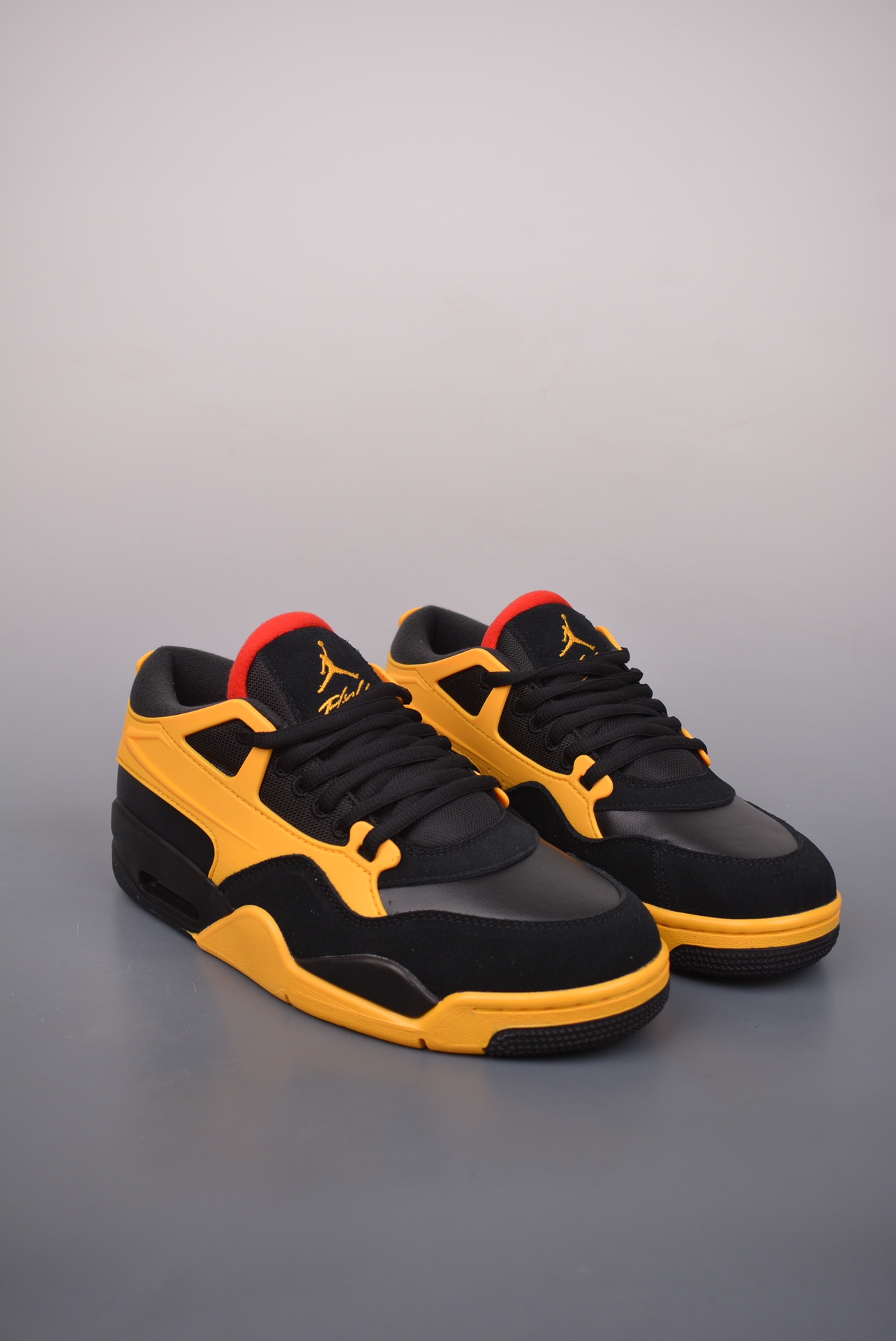 Nigel Sylvester x Jordan Air Jordan 4 RM AJ4 black and yellow FQ7939-007