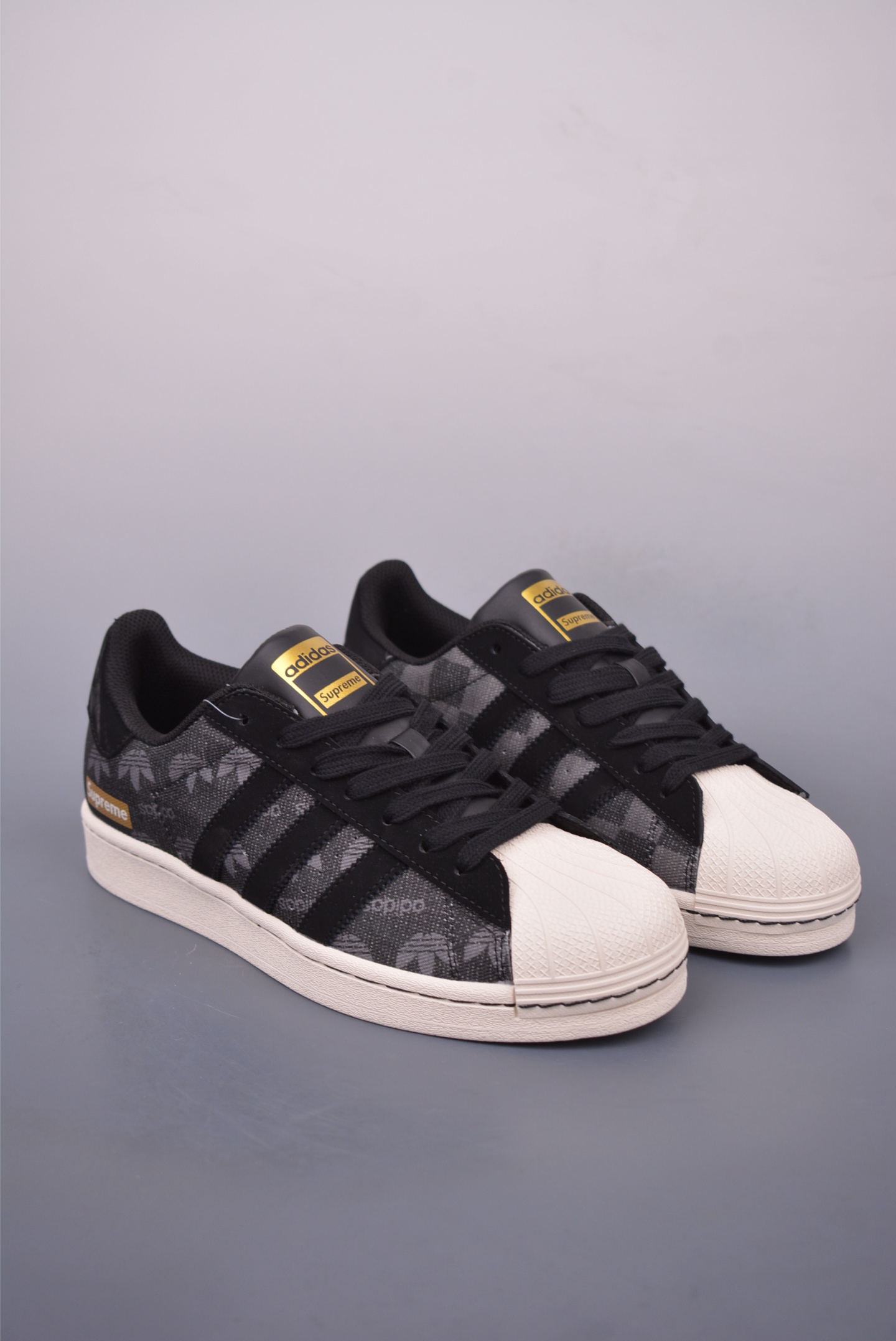 Supreme x Adidas Originals Superstar sneakers Black and Gold Trefoil Z2531