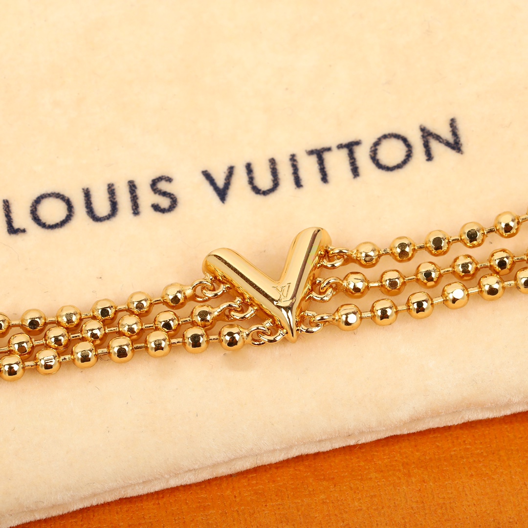 Louis Vuitton triple bead necklace