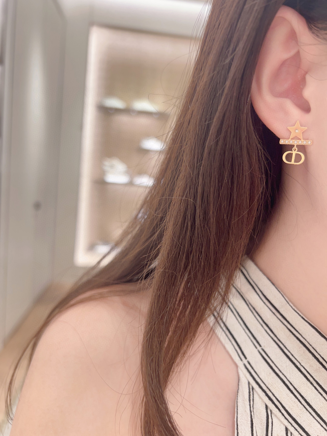 Dior star horizontal bead cd earrings