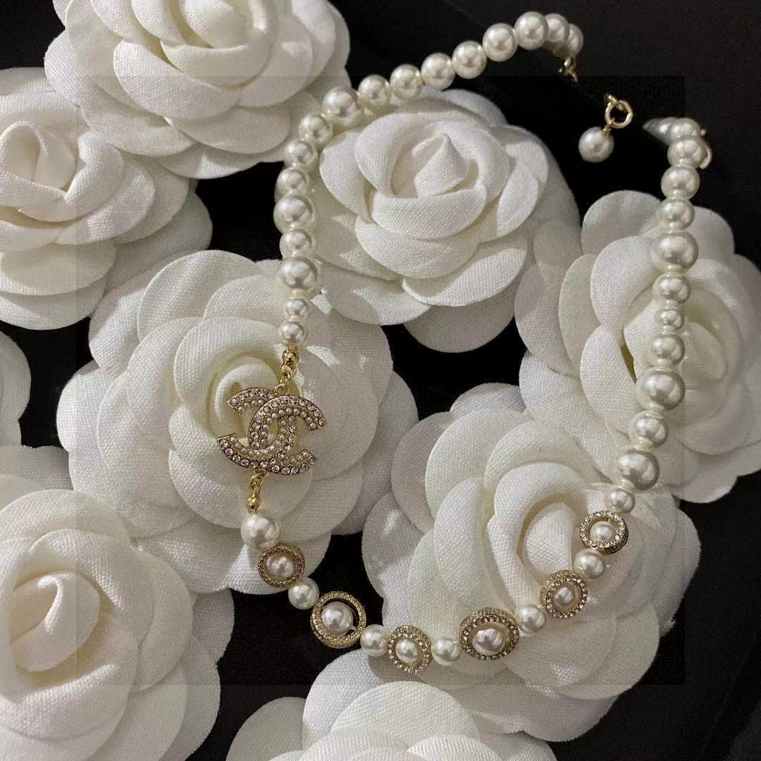 Chanel full diamond pearl bow