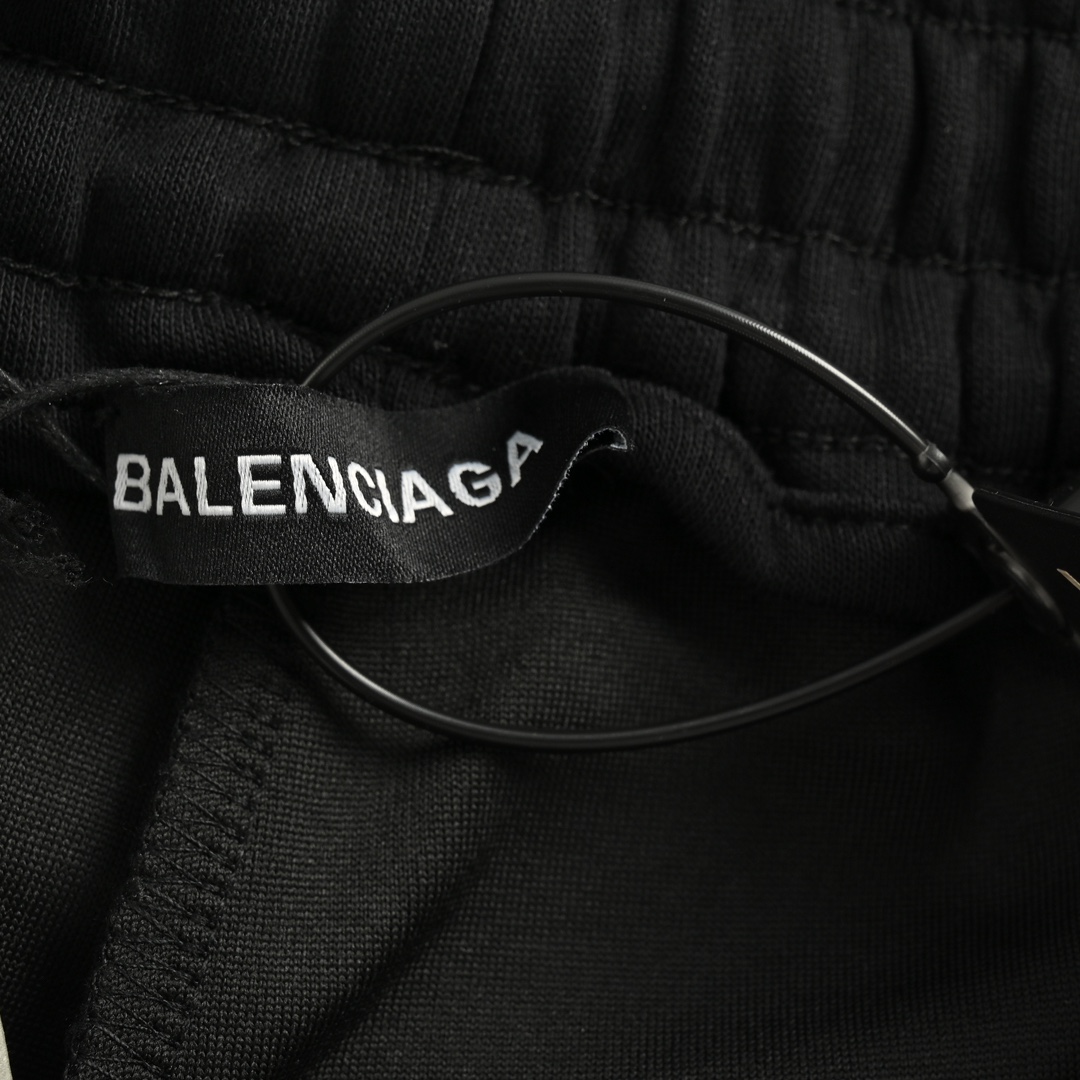Balenciaga triangle logo trousers
