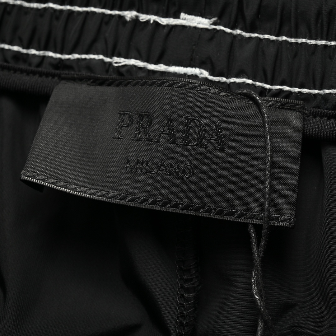 Prada 23ss nylon shorts with exposed triangle logo