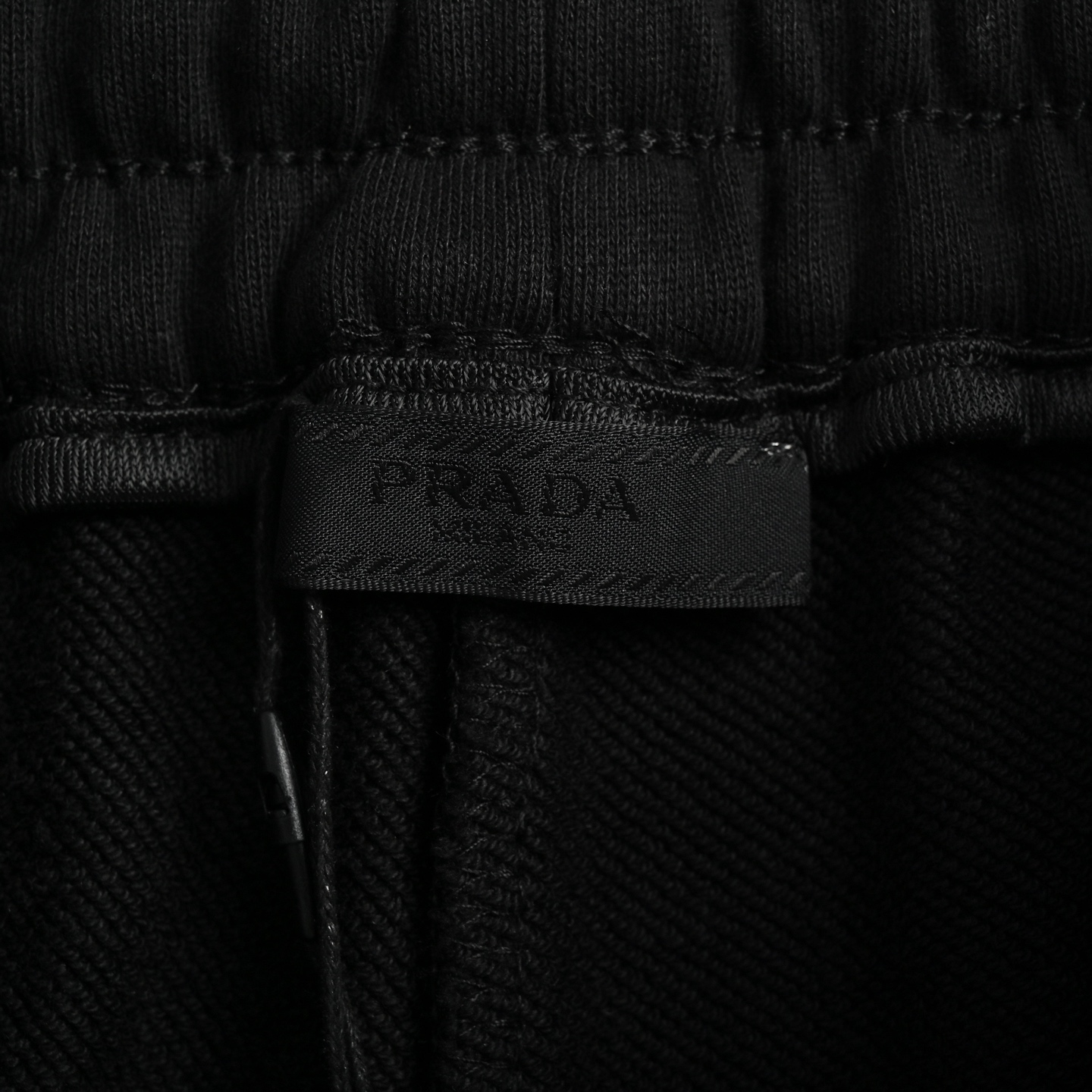 Prada Logo Embroidered Back Pocket Metal Triangle Shorts