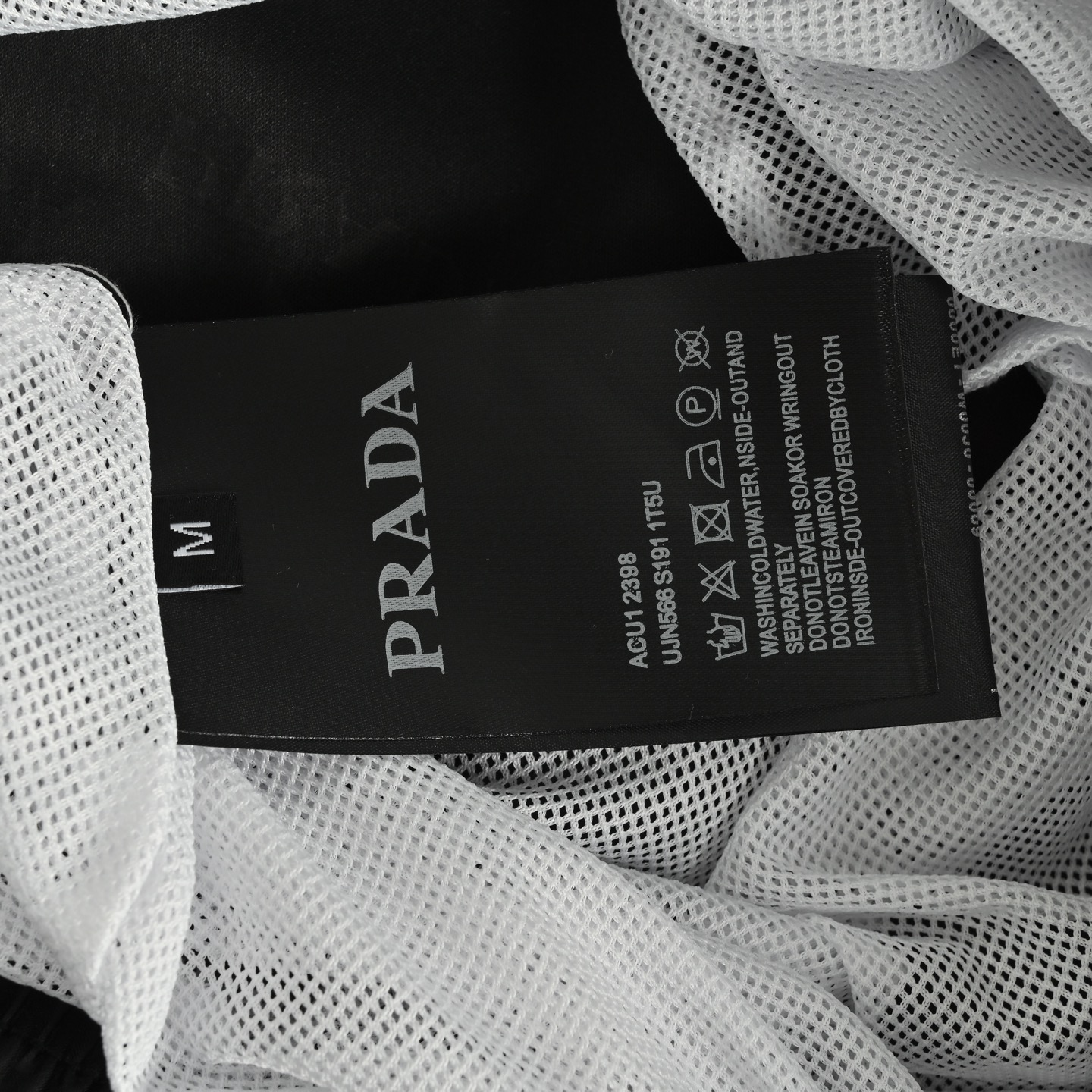 Prada 25ss all-over logo beach shorts