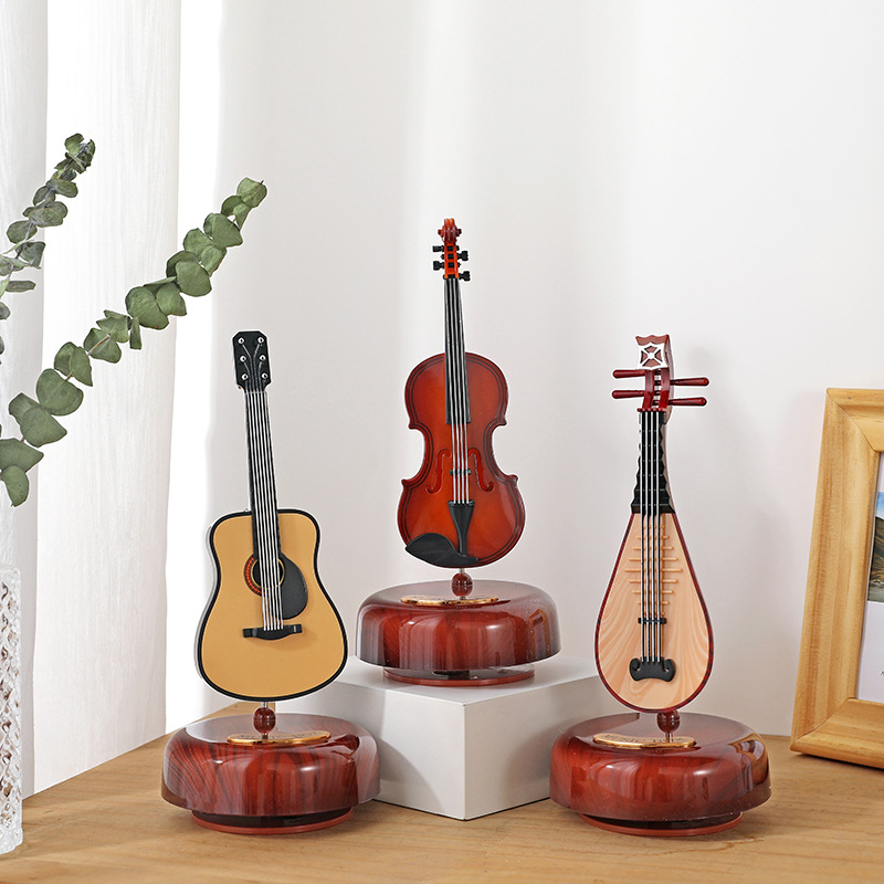 🎸✨2024 New Rotating Music Box