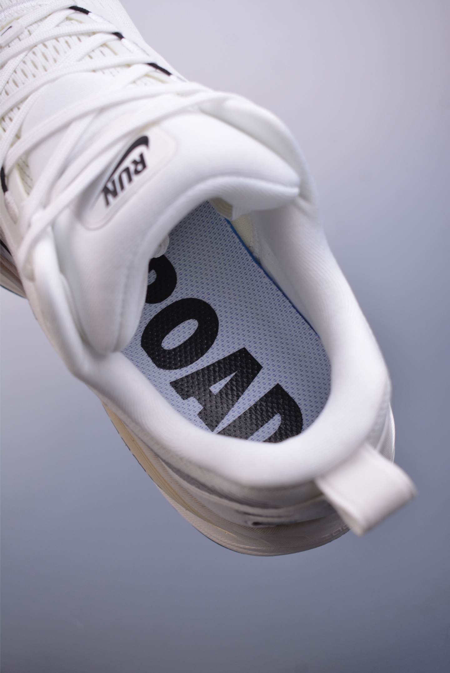 Nike Vomero 18 ZoomX running shoes off-white and black hook HM6803-101