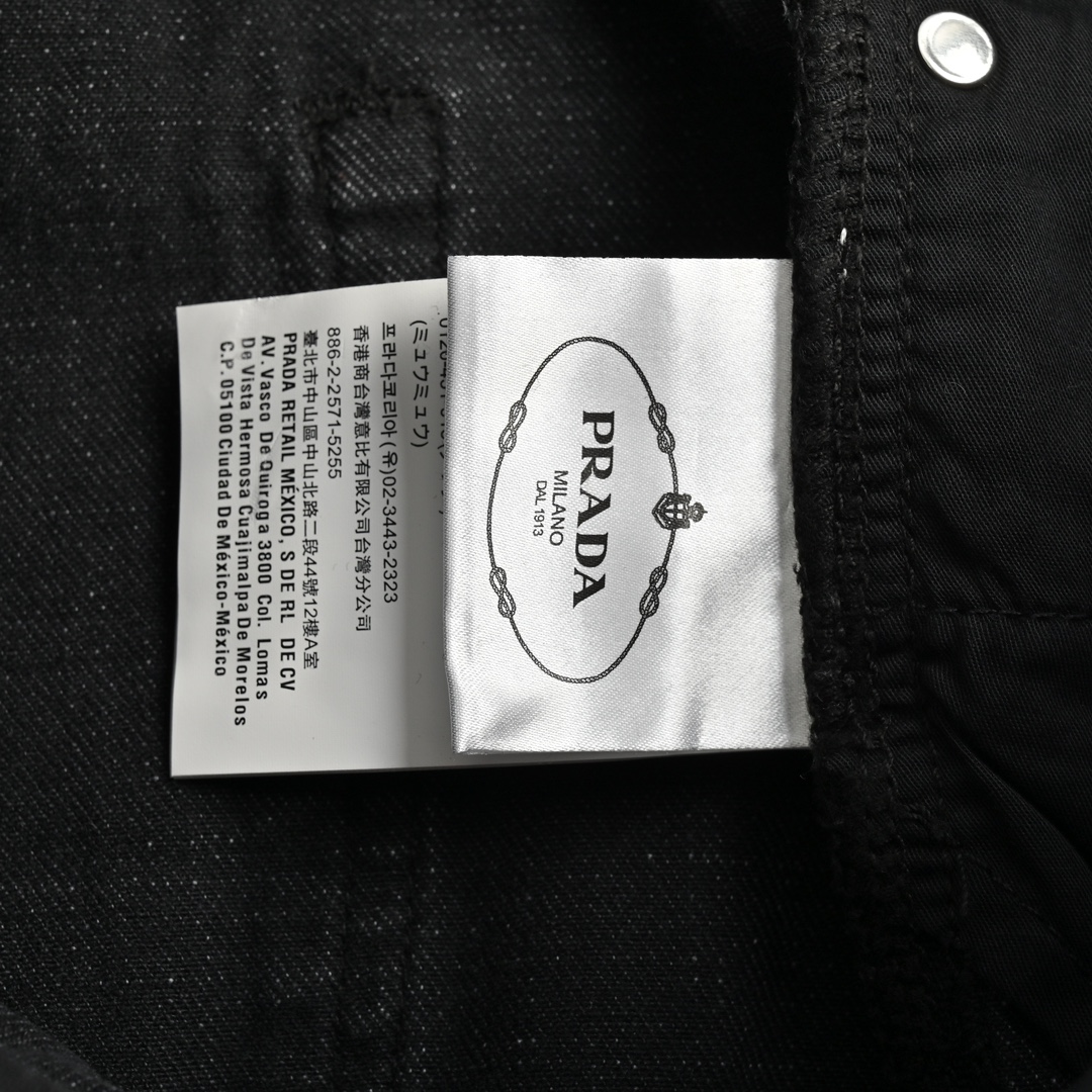 Prada 23Fw washed jeans with triangle logo embroidery