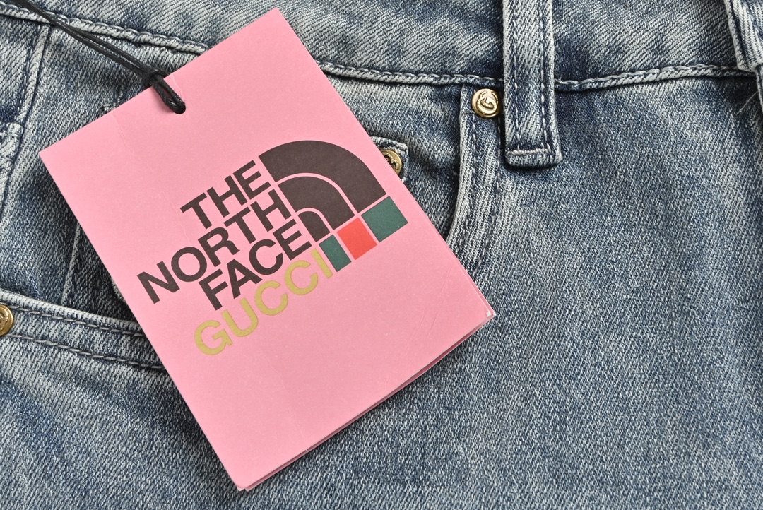 Gucci & The North face co-branded embroidered logo jeans