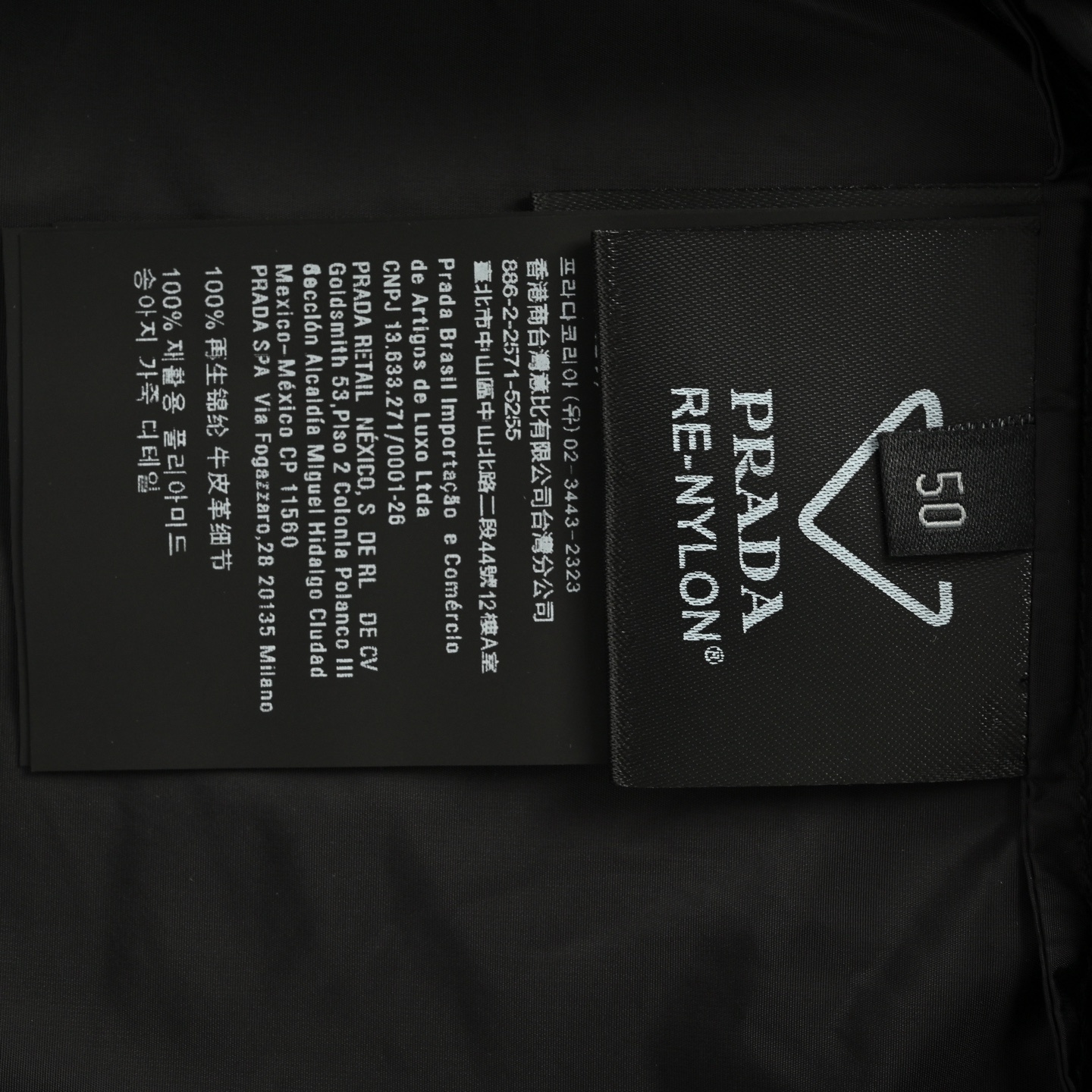 Prada 25Fw flap pocket concealed button recycled nylon stand collar jacket