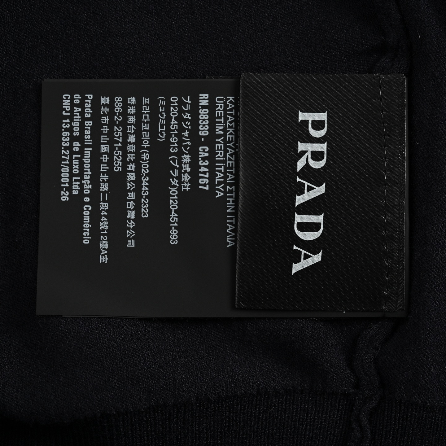 Prada 25ss embroidered logo half-zip knitted Polo short sleeve