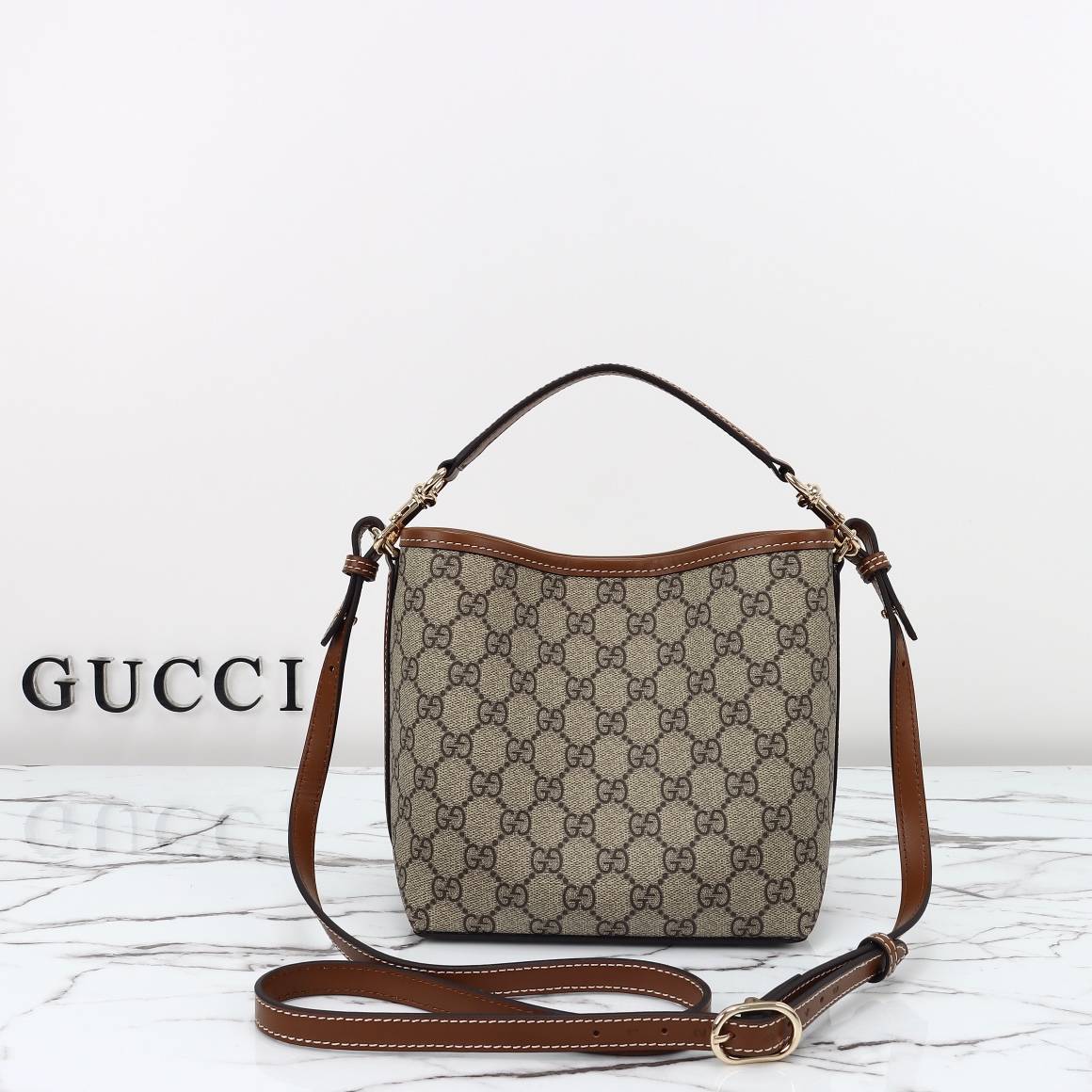 Gucci GG Emblem small bucket bag ‎815118 FAD6L 9758
