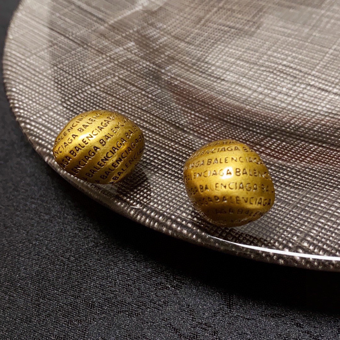 Balenciaga antique gold engraved letter earrings