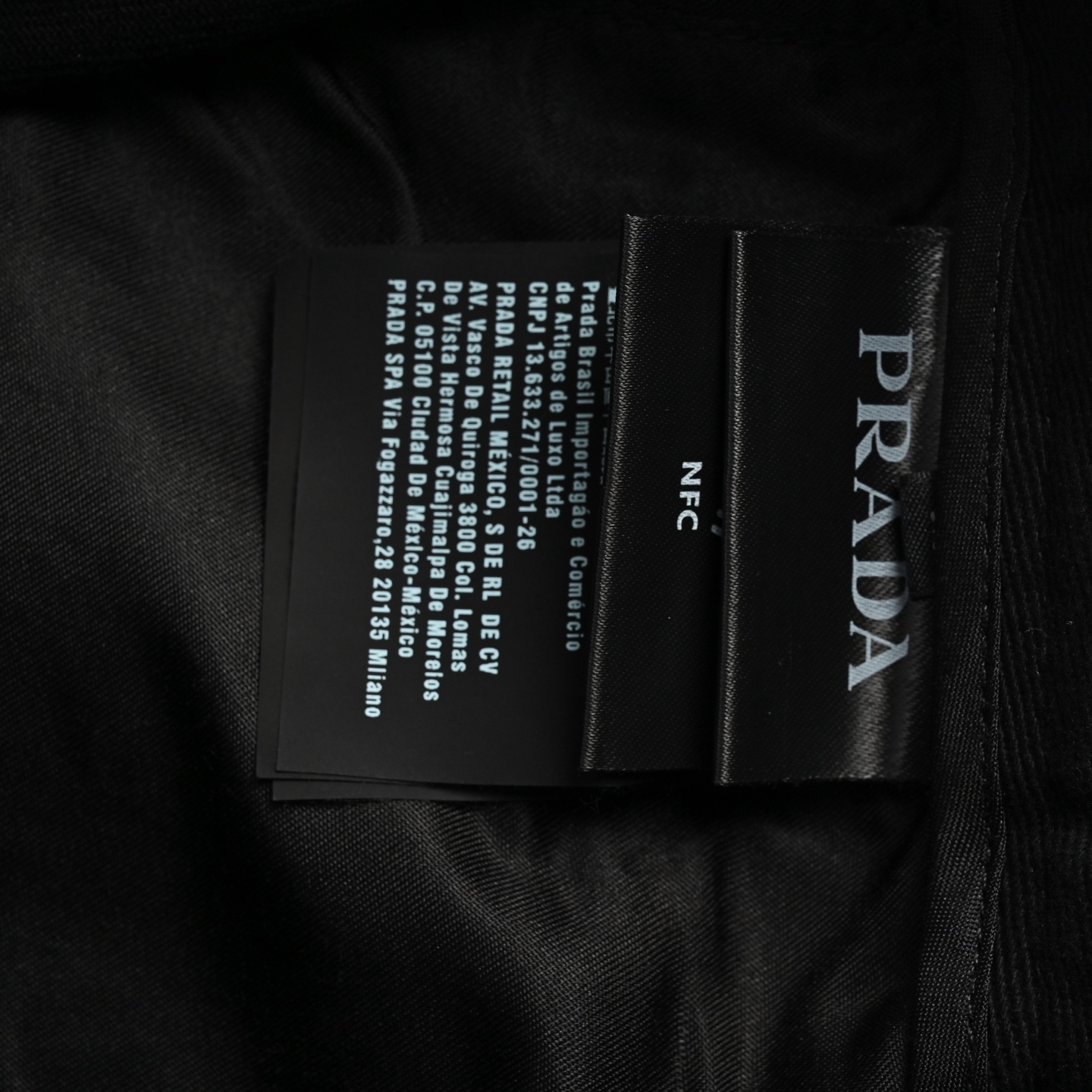 Prada 25ss pocket triangle logo cargo trousers