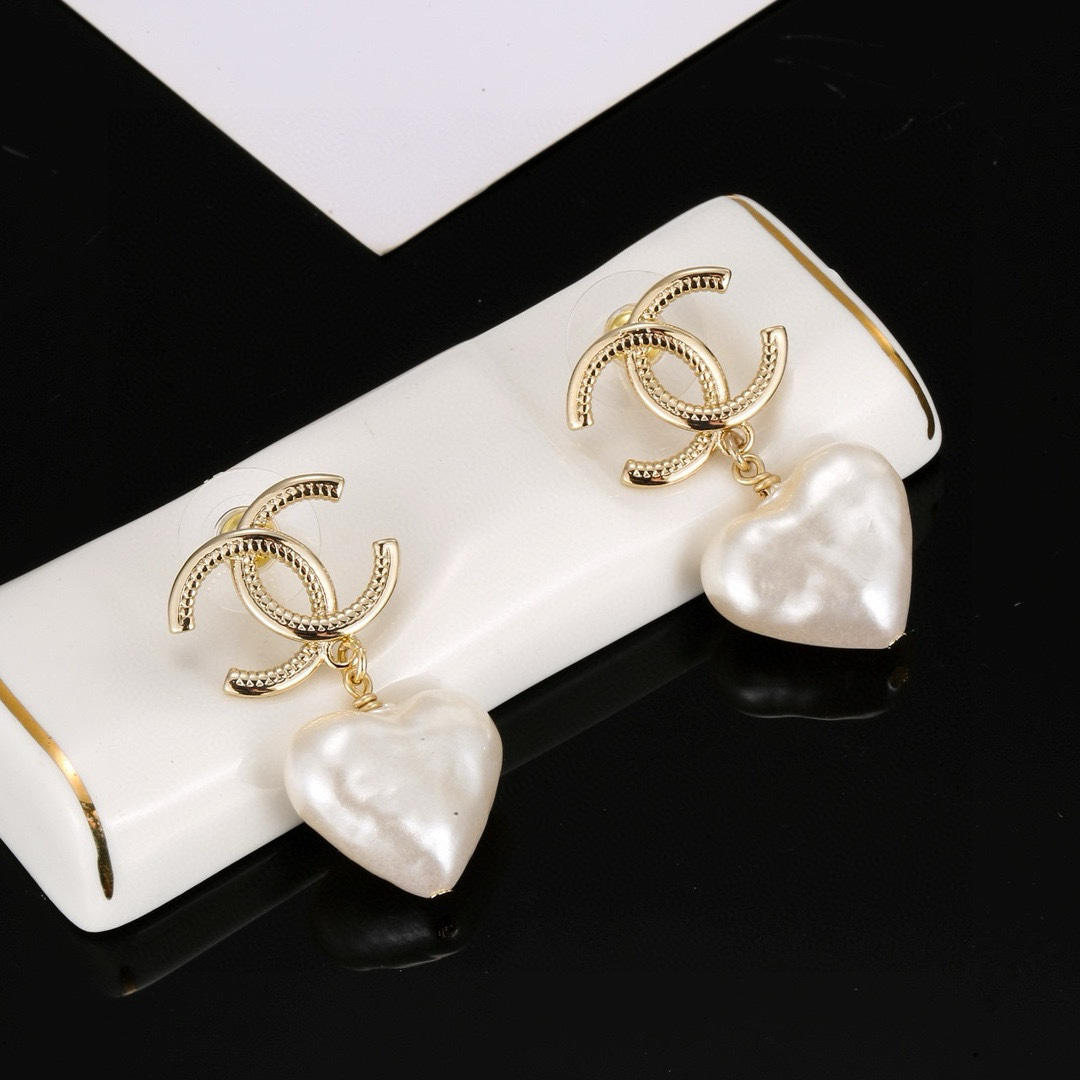 Chanel light gold heart earrings