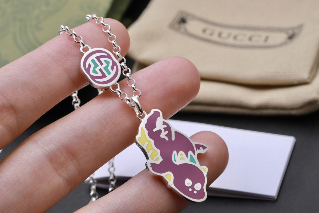 Gucci custom made super cute little flying dragon necklace