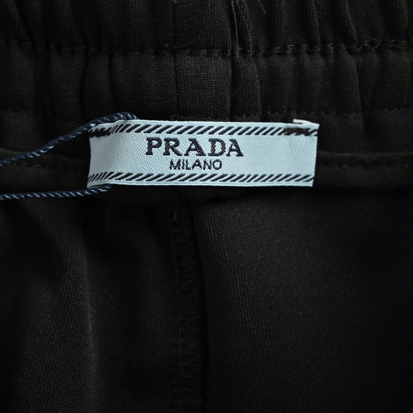 Prada 25ss triangle red rubber logo shorts
