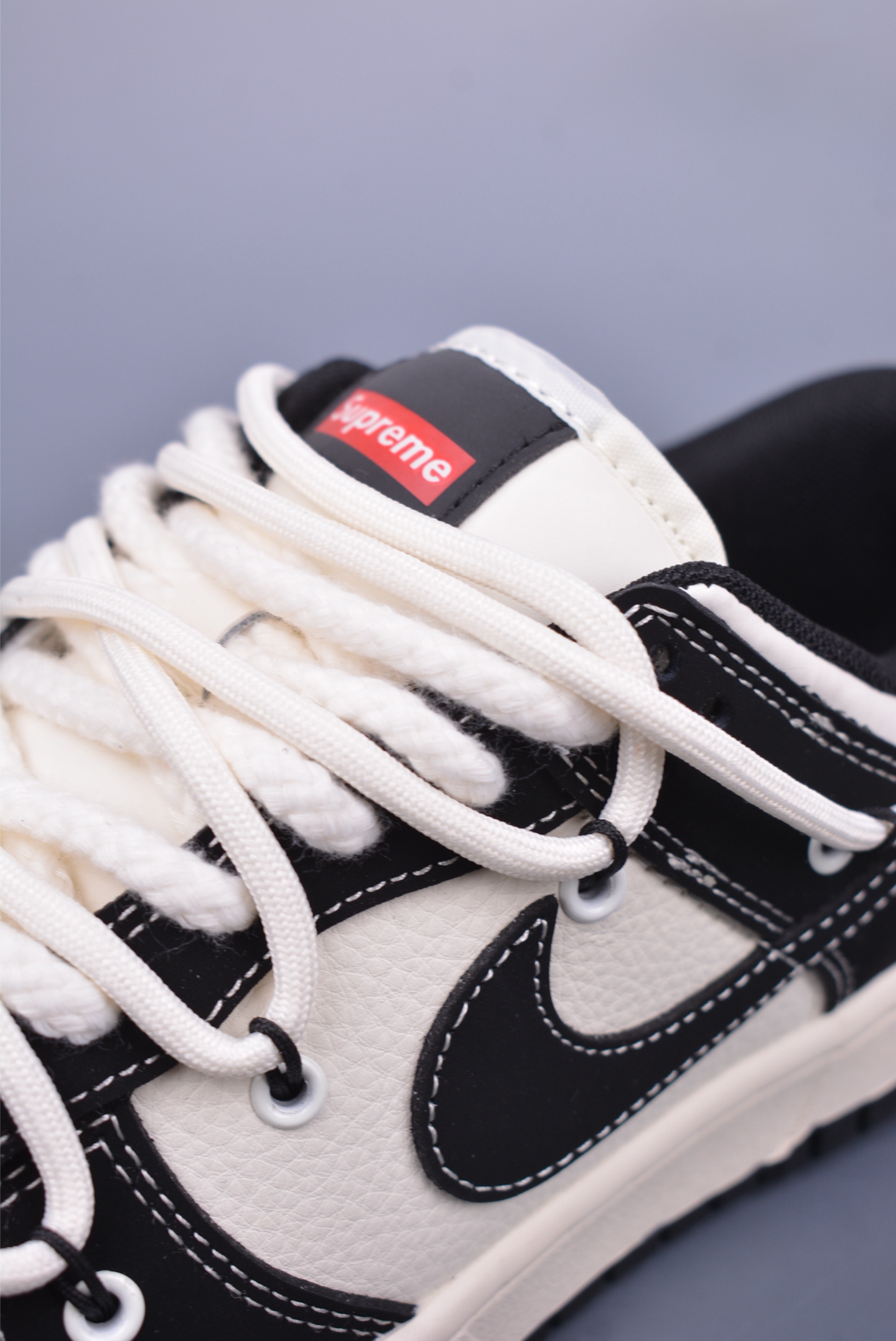 Supreme x Nike SB Dunk Low sneakers black and white YX5066-280