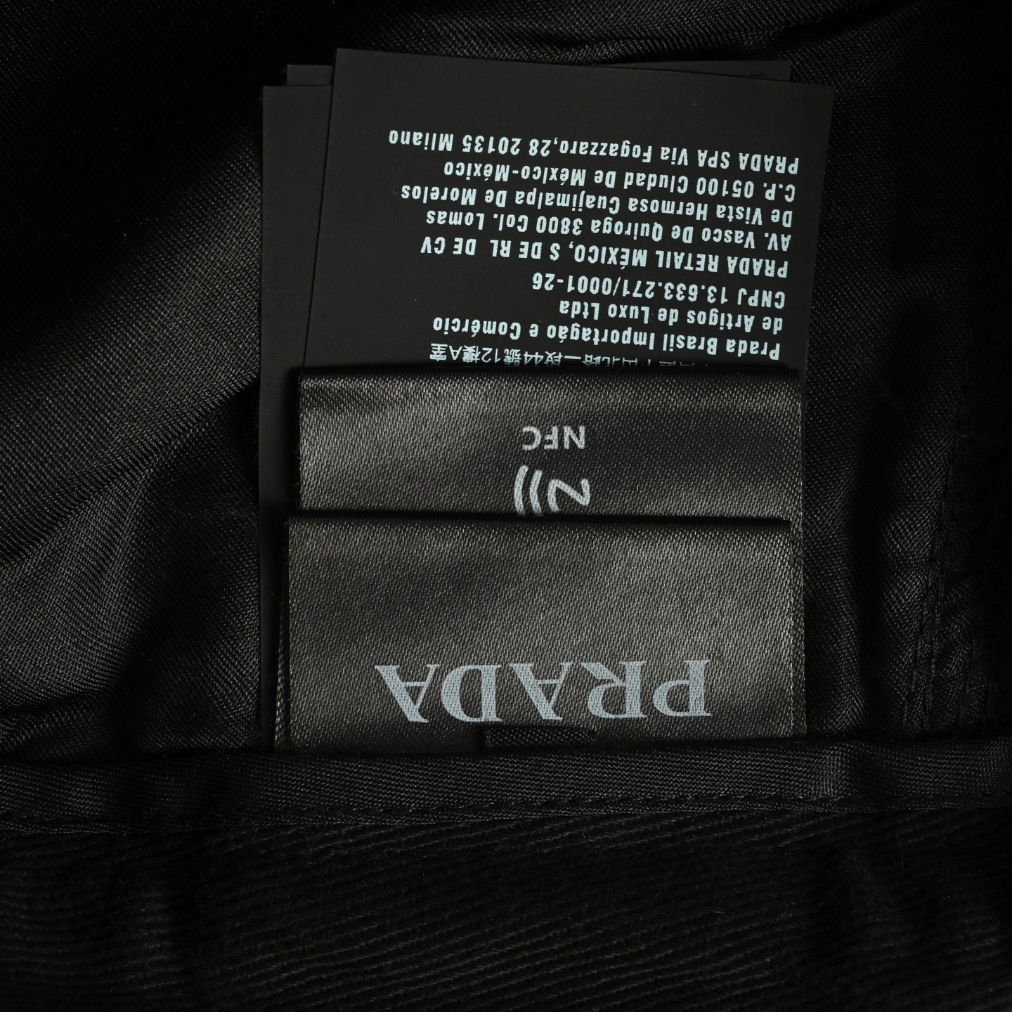 Prada 25ss pocket triangle logo cargo trousers