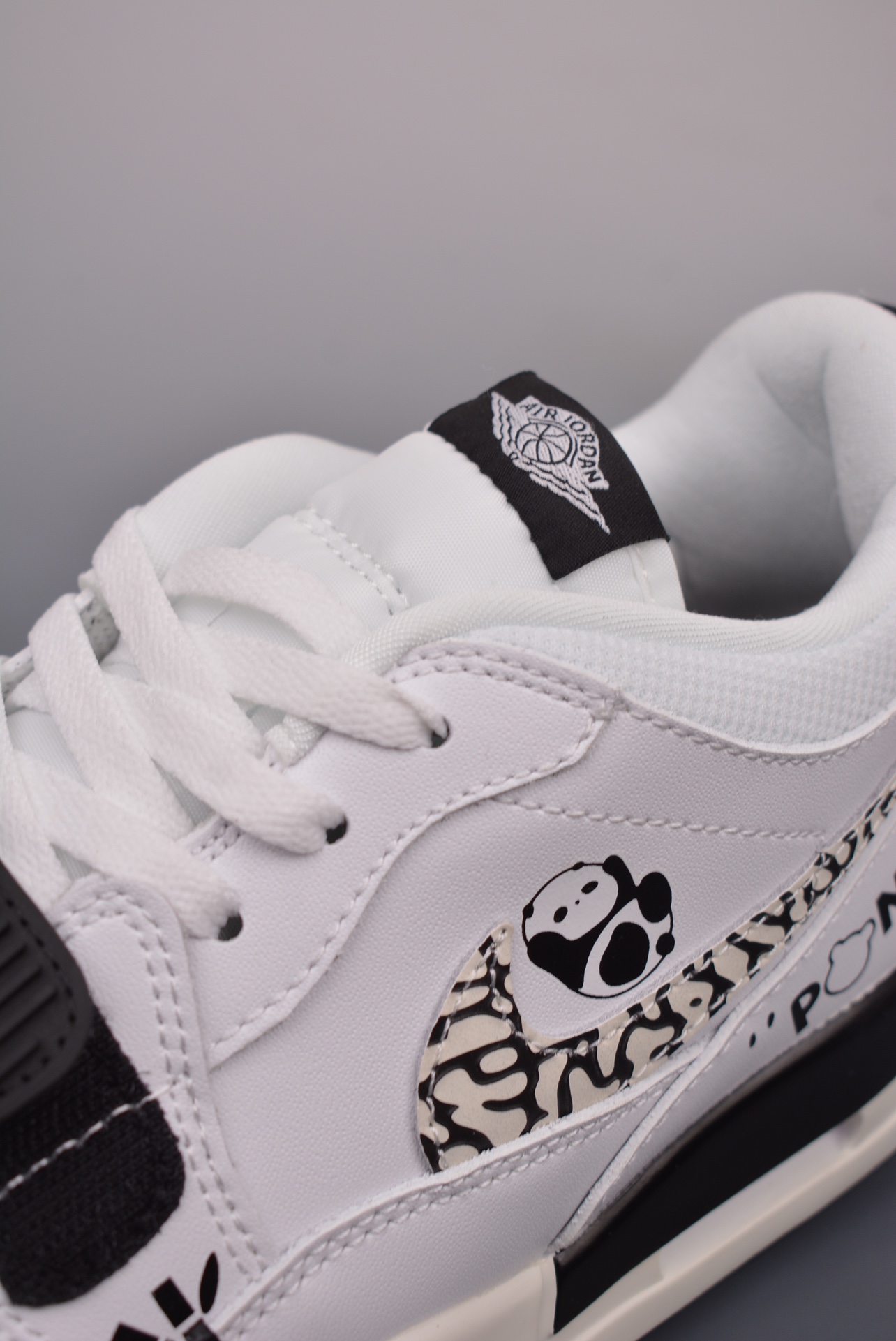 Nike Air Jordan Legacy 312 Low Cement Swoosh Panda CD7069-110