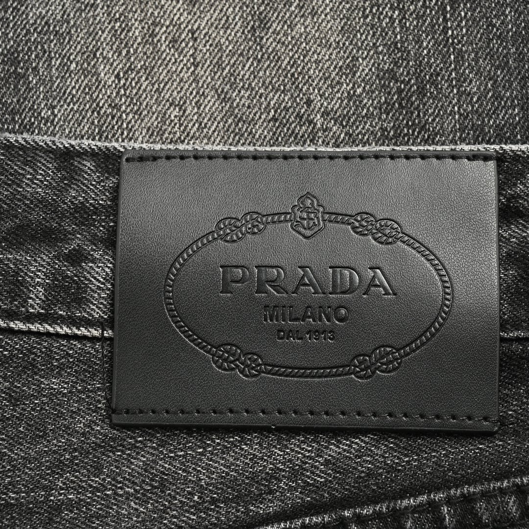 Prada 23Fw triangle logo embossed washed denim