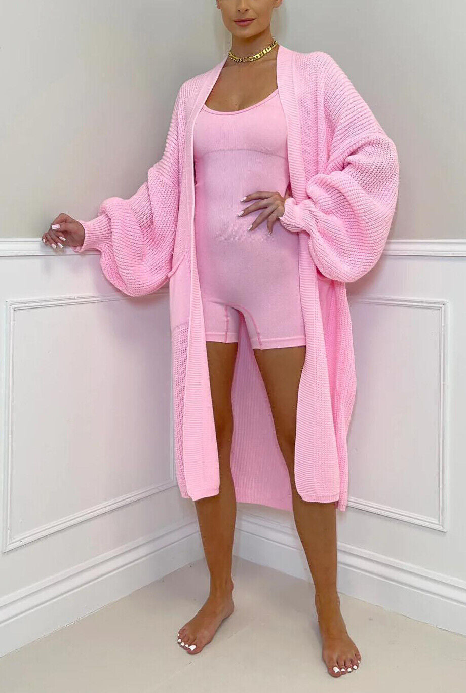 Mid-Length Sweater Coat for Women with a Knitwear Texture.