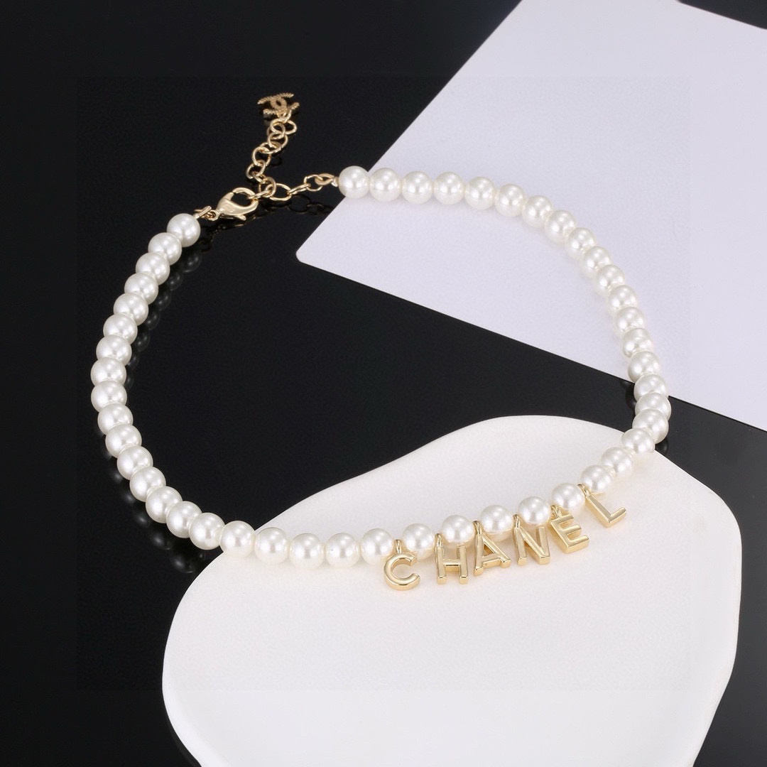 Chanel alphabet pearl necklace