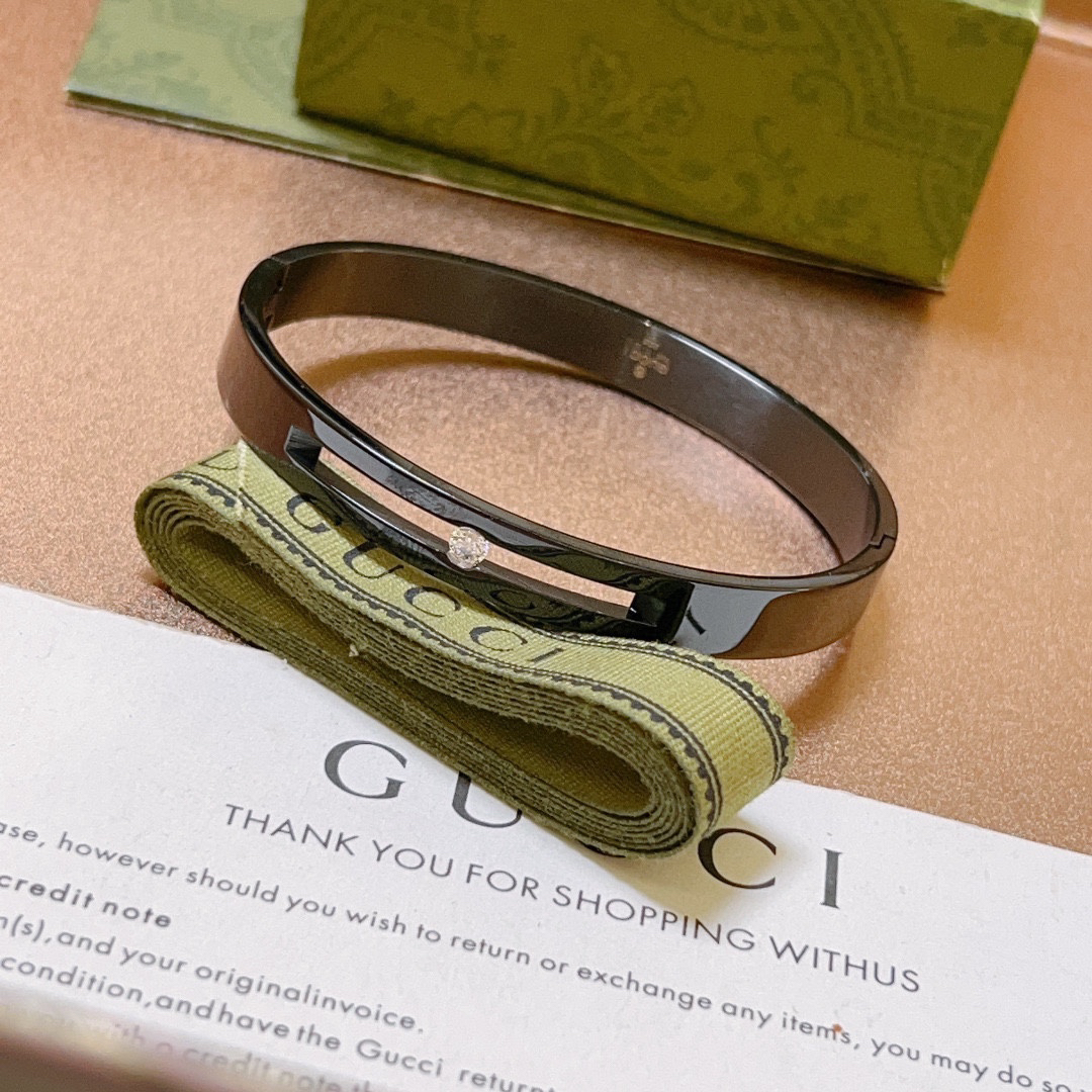 Gucci hollow diamond black bracelet