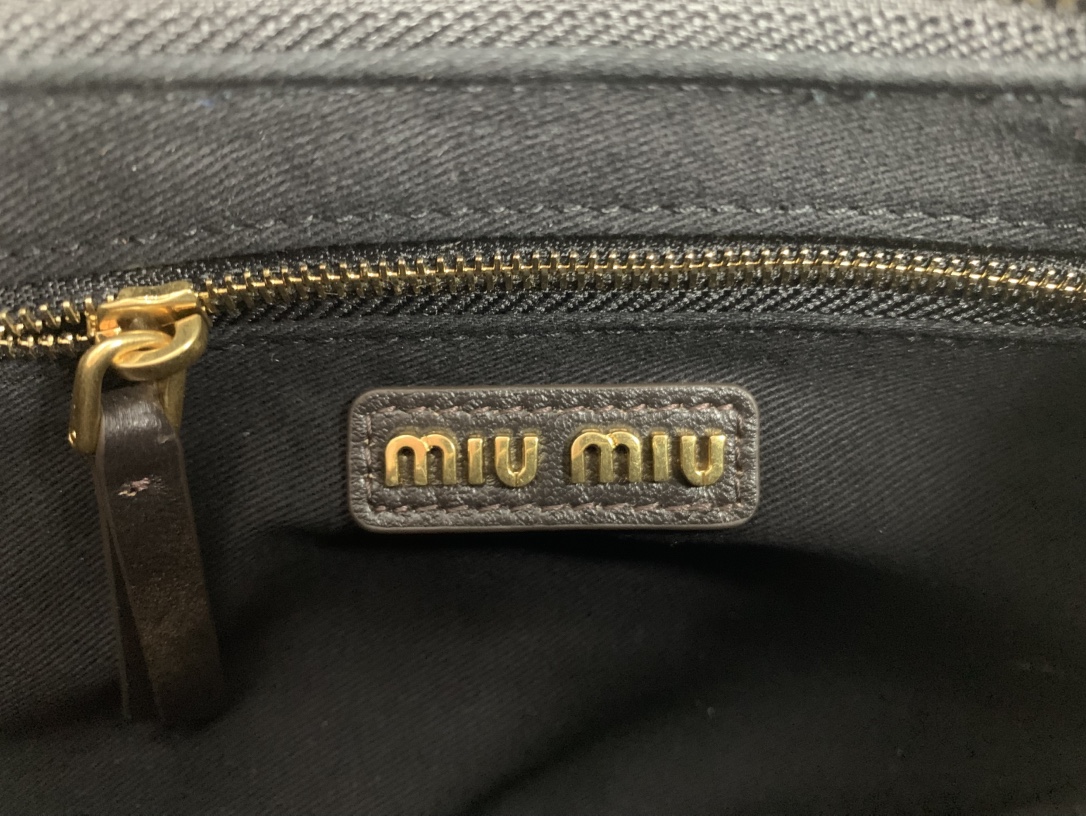 Miu Miu Multi-Pocket Biker Bag